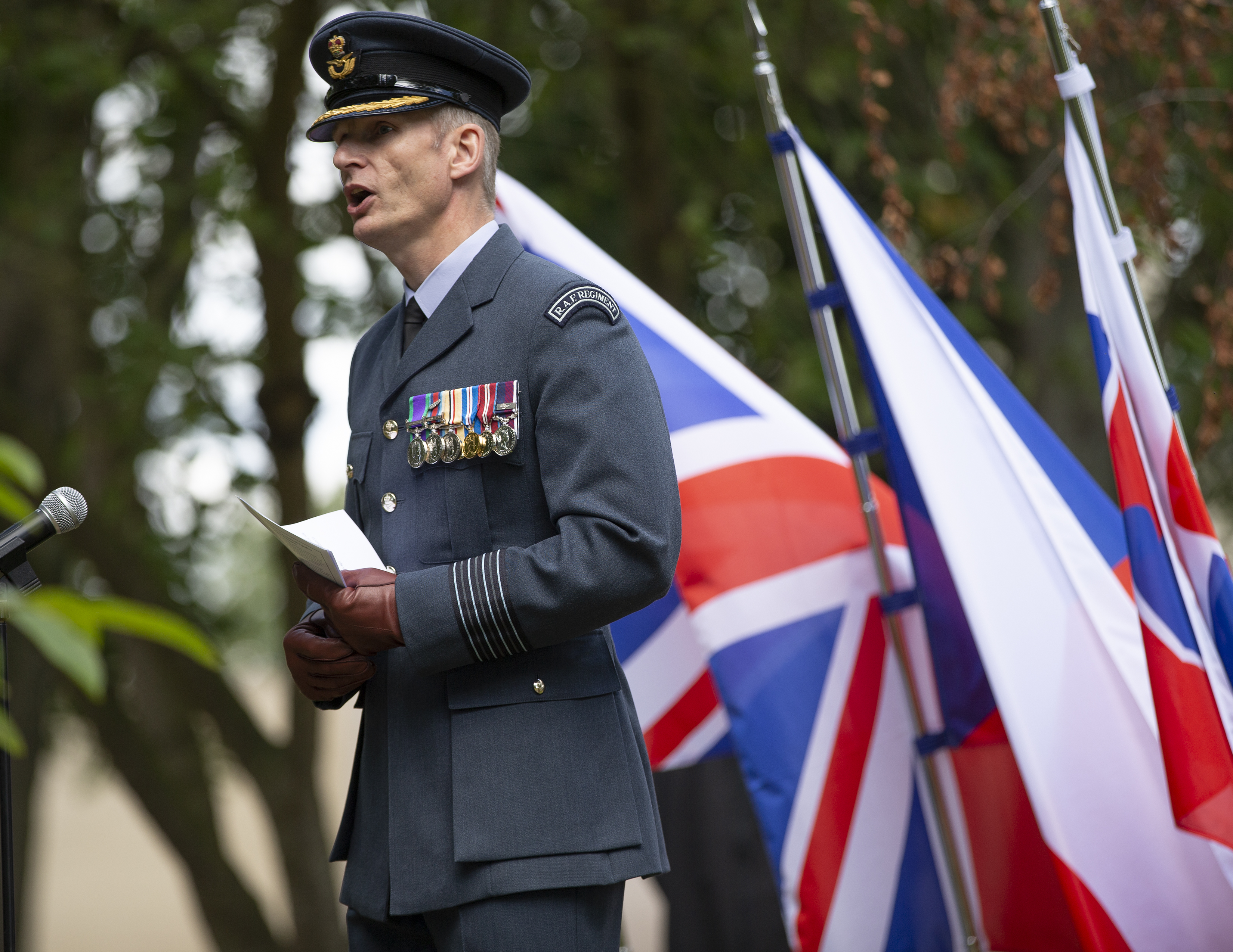 Group Captain Matt Radnall, Station Commander of RAF Honington, spoke during the cermony (Picture: MOD).