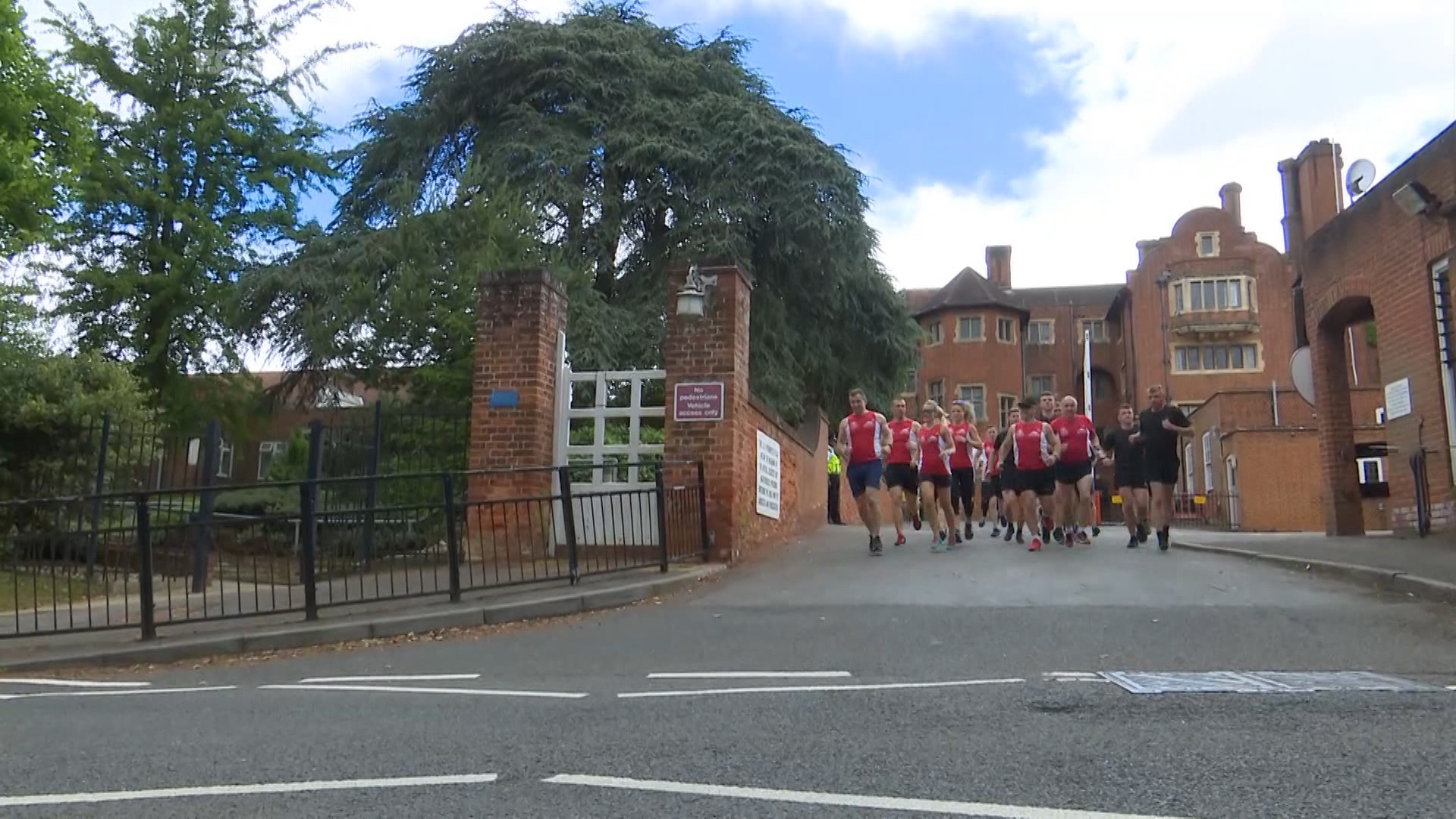 The group jog out of Headley Court in Surrey.