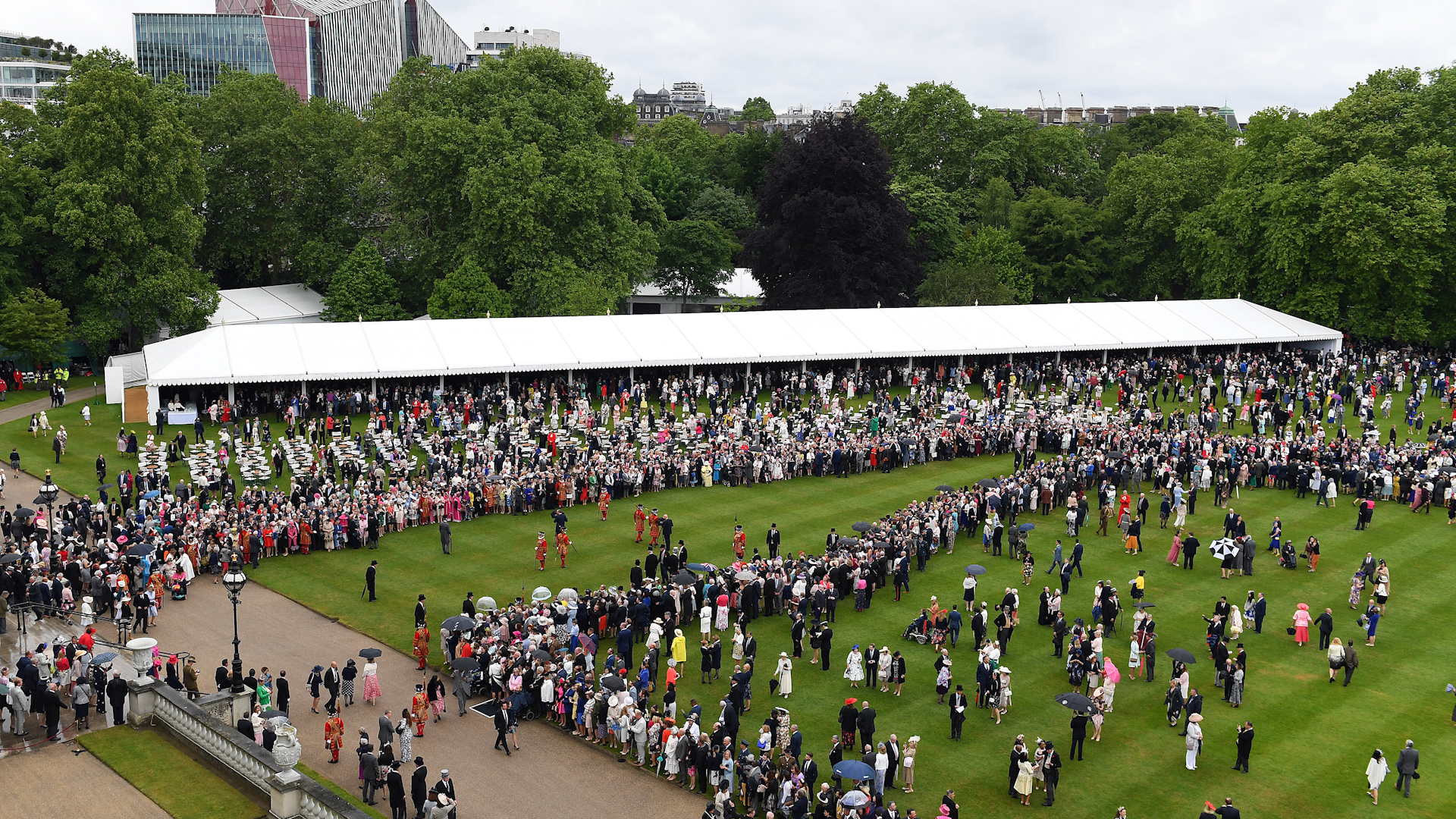 Guests during a Royal Garden Party at Buckingham Palace in London 290519 CREDIT PA.