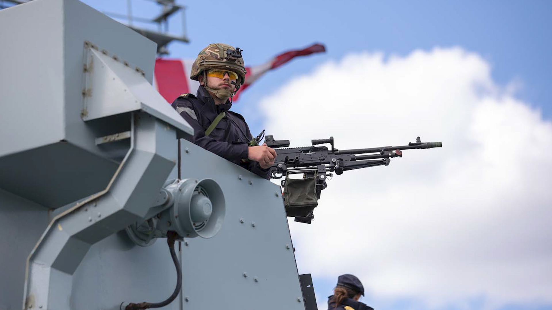 Gunner on HMS Lancaster bridge wing during weapons trials 100620 CREDIT Royal Navy