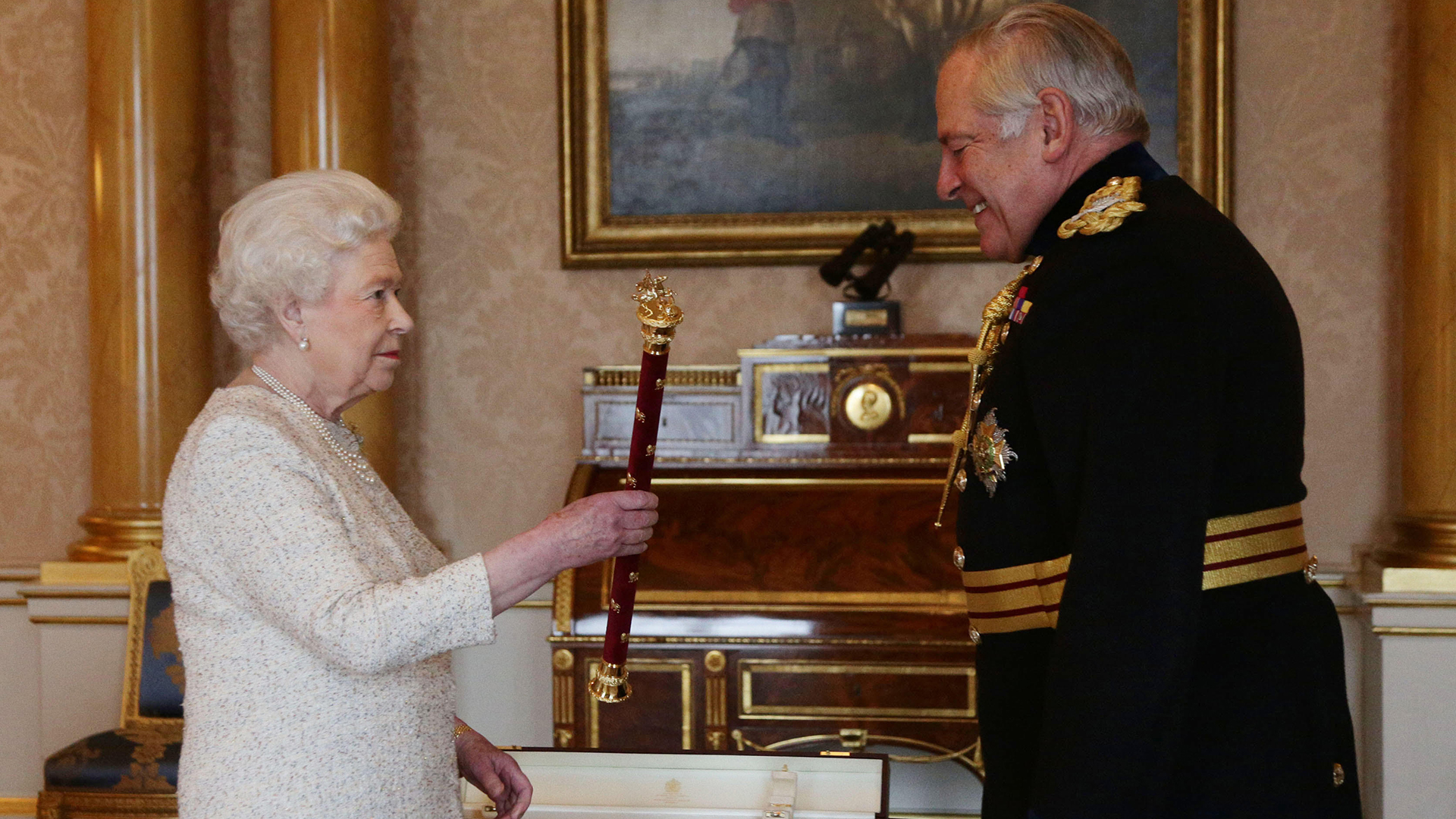 Lord Guthrie receives his Field Marshal's baton from Queen Elizabeth II at Buckingham Palace