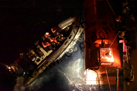 HMS Argyll's seaboat  'nudged'  the ship's lifeboat to help sailors escape (Picture: Royal Navy).