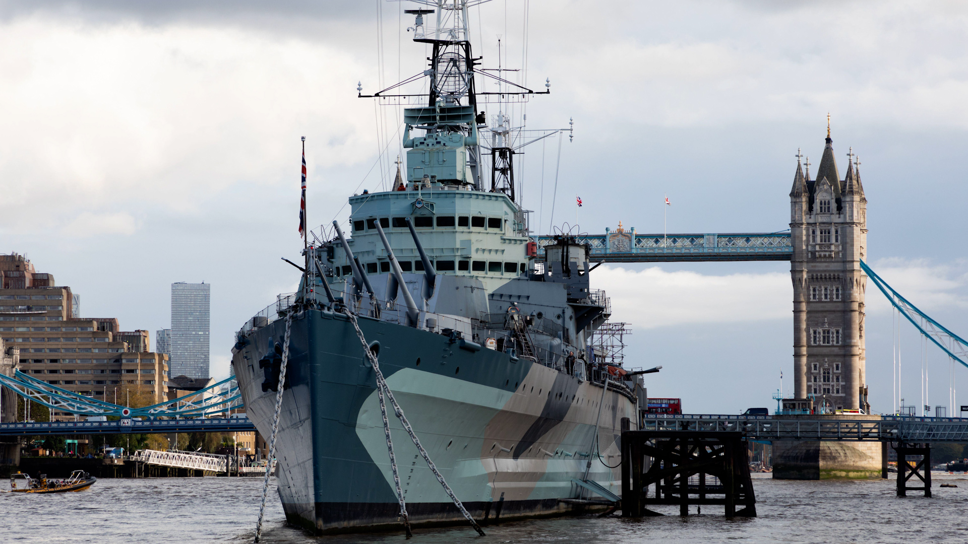 HMS Belfast, a museum ship operated by the Imperial War Museum, moored on the River thames close to Tower Bridge