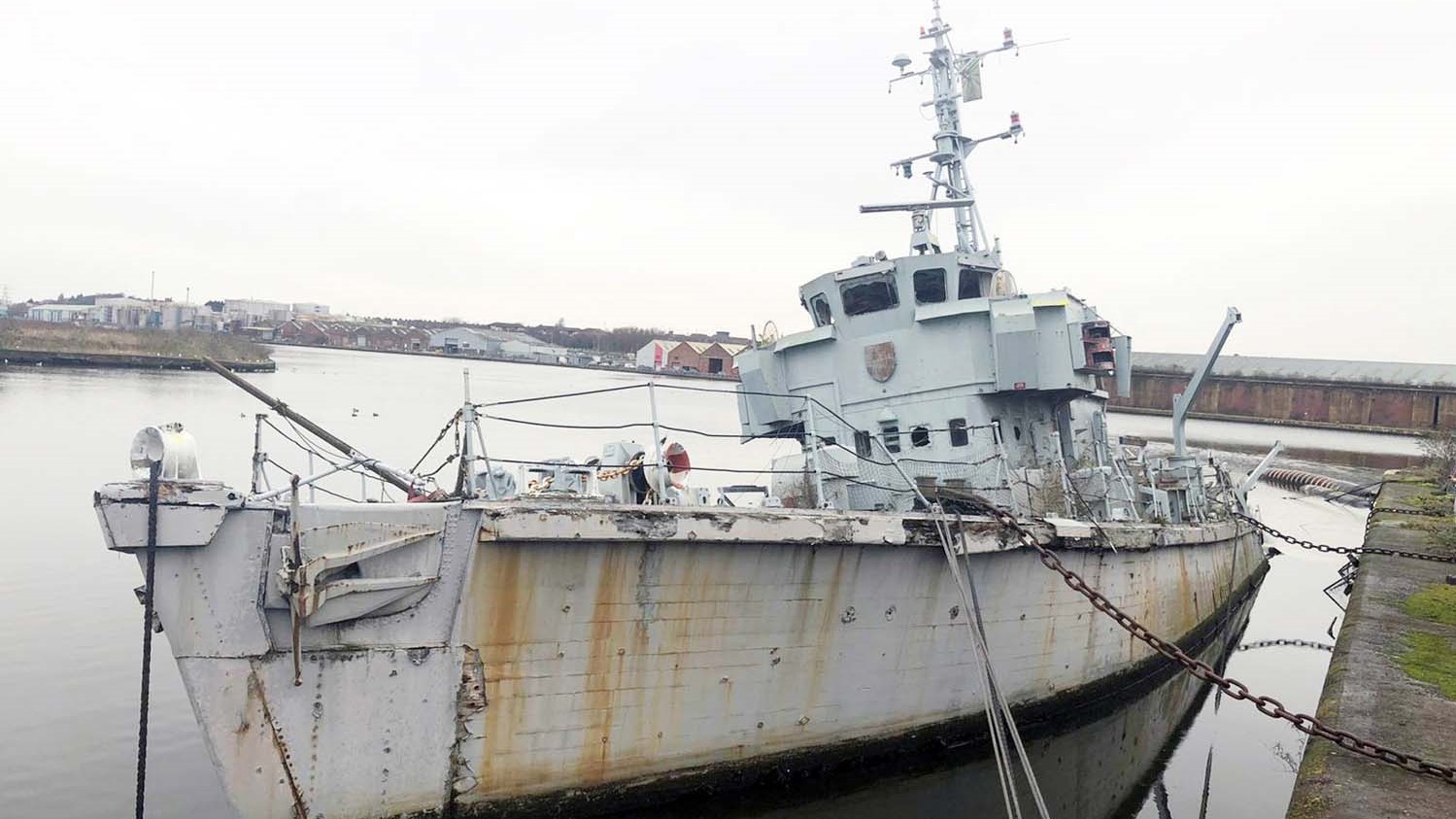 HMS Bronington partially submerged and listing at her berth 27072022 CREDIT Royal Navy.jpg
