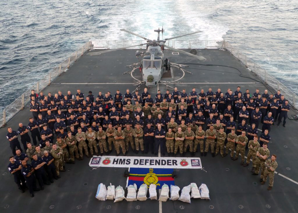 The crew of HMS Defender celebrate the drugs bust (Picture: Royal Navy).