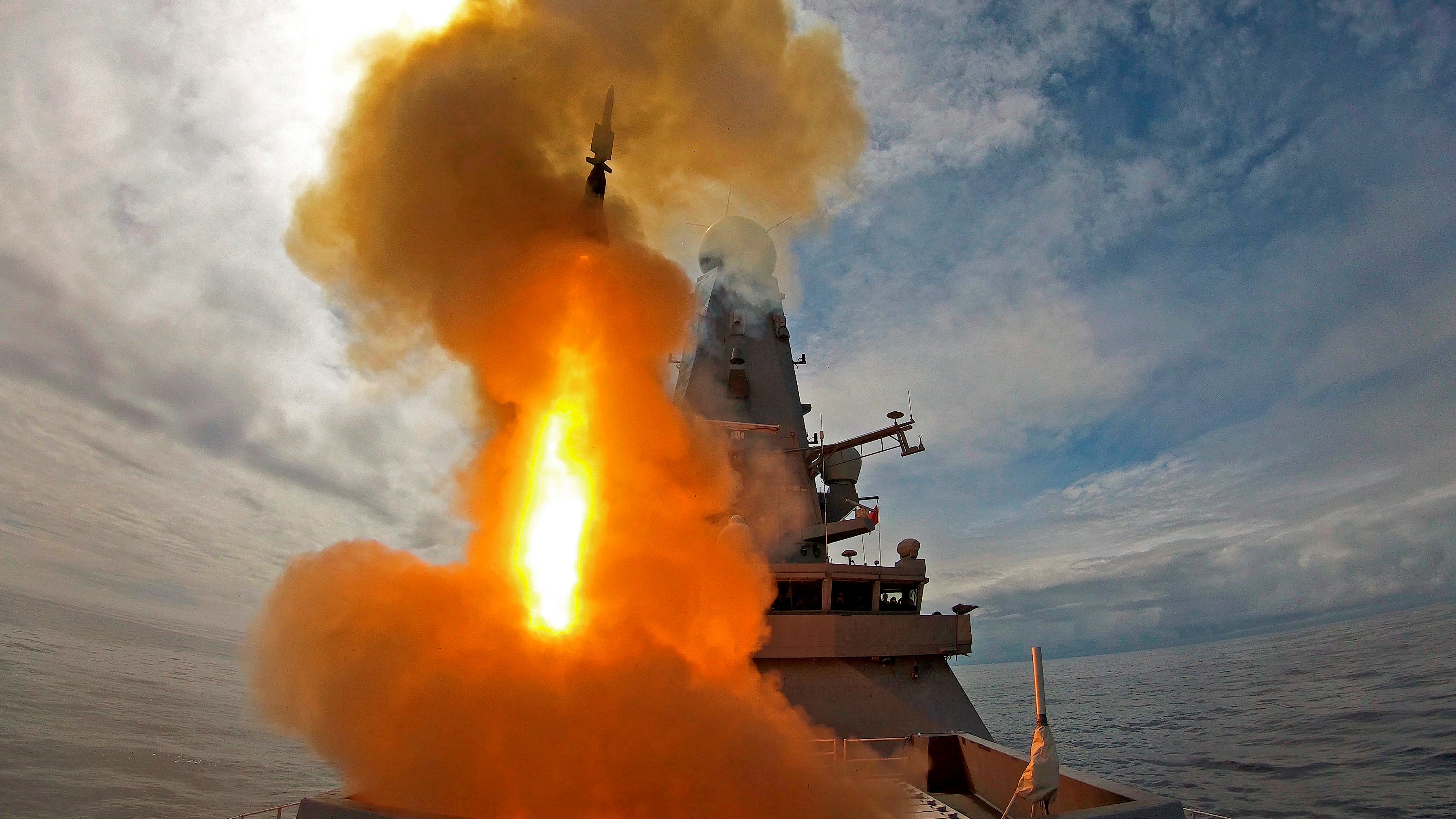 Royal Navy Type 45 destroyer HMS Defender pictured carrying out a successful firing of a Sea Viper missile during a training exercise