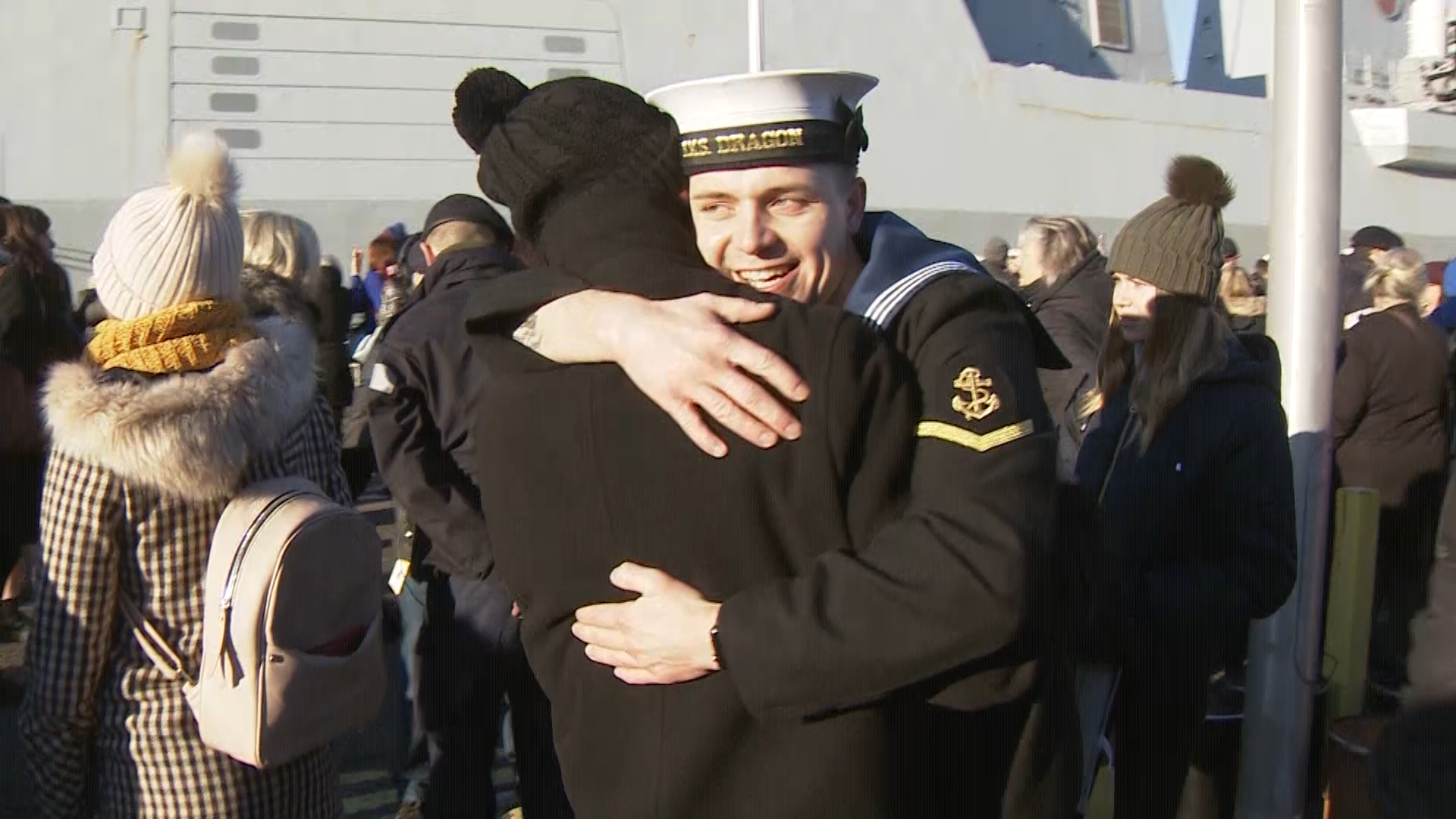 Sailors were greeted by family members after three months away from home.