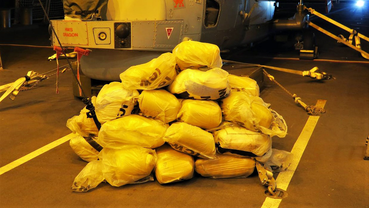 HMS Dragon displays part of three tonne seizure of hashish drugs
