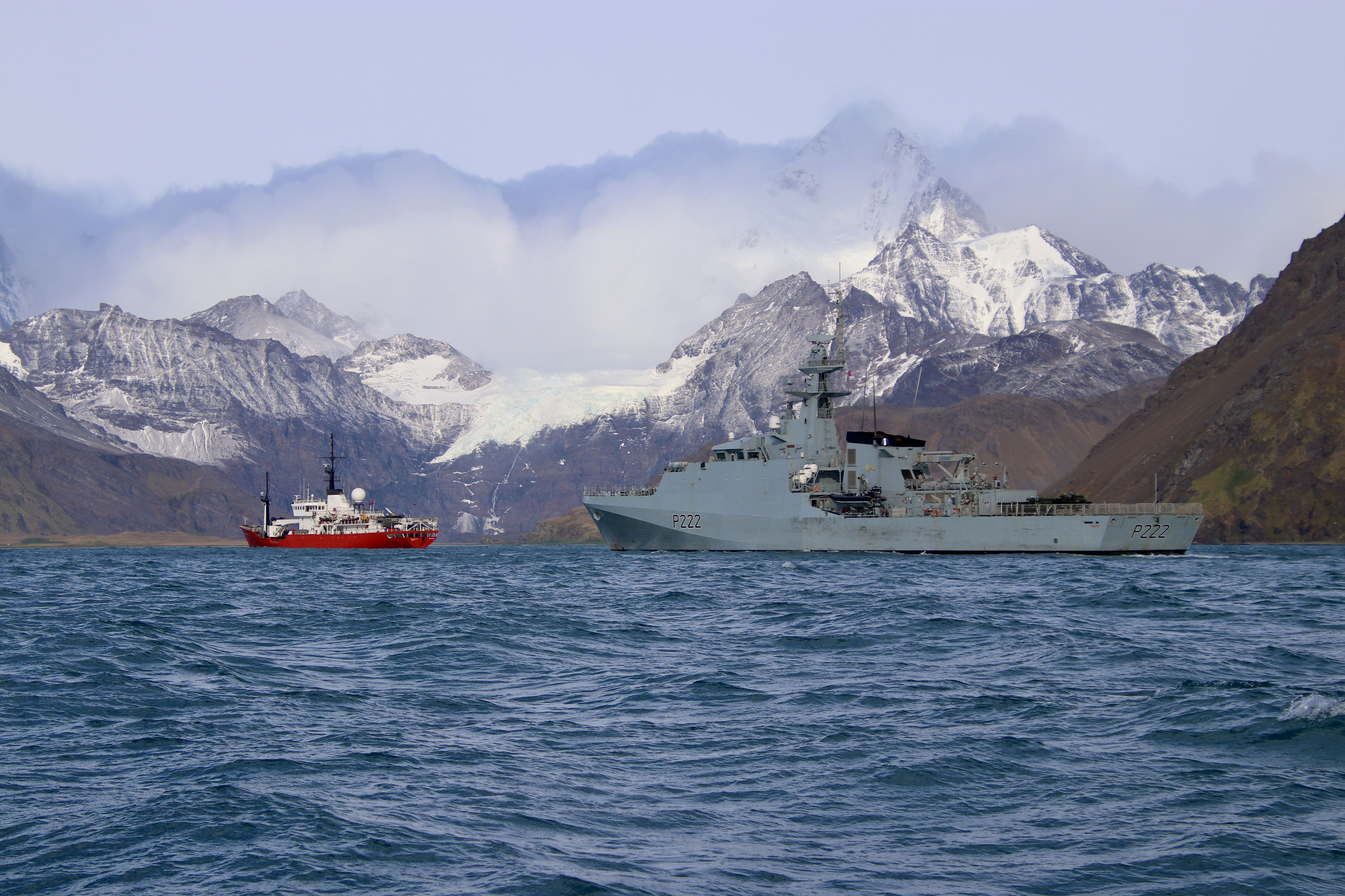 HMS Forth with fishery protection ship Pharos SG off the island's coastline (Picture: Royal Navy).