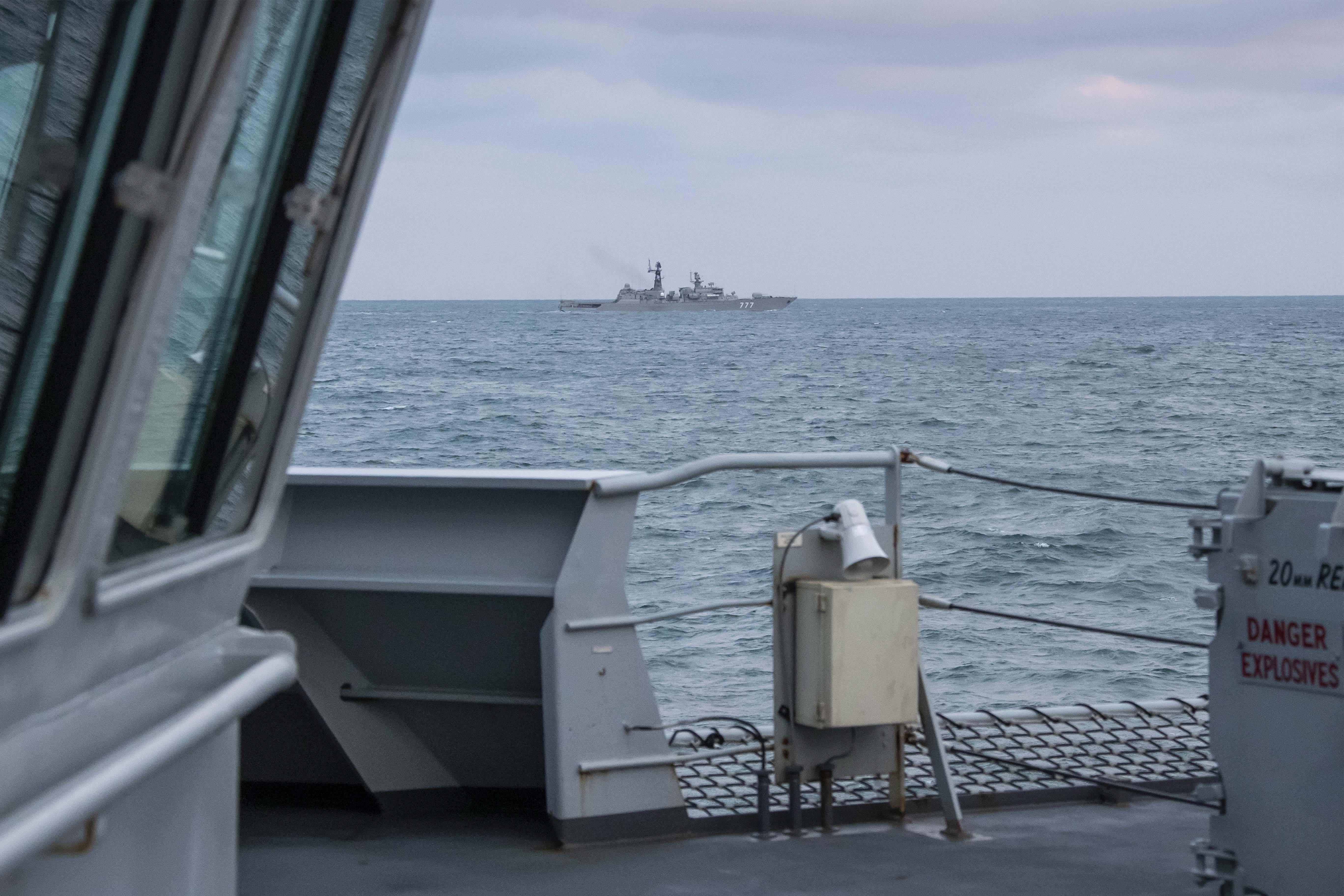 A picture, taken on board HMS Mersey, is said to show the Russian frigate in the distance (Picture: Royal Navy).