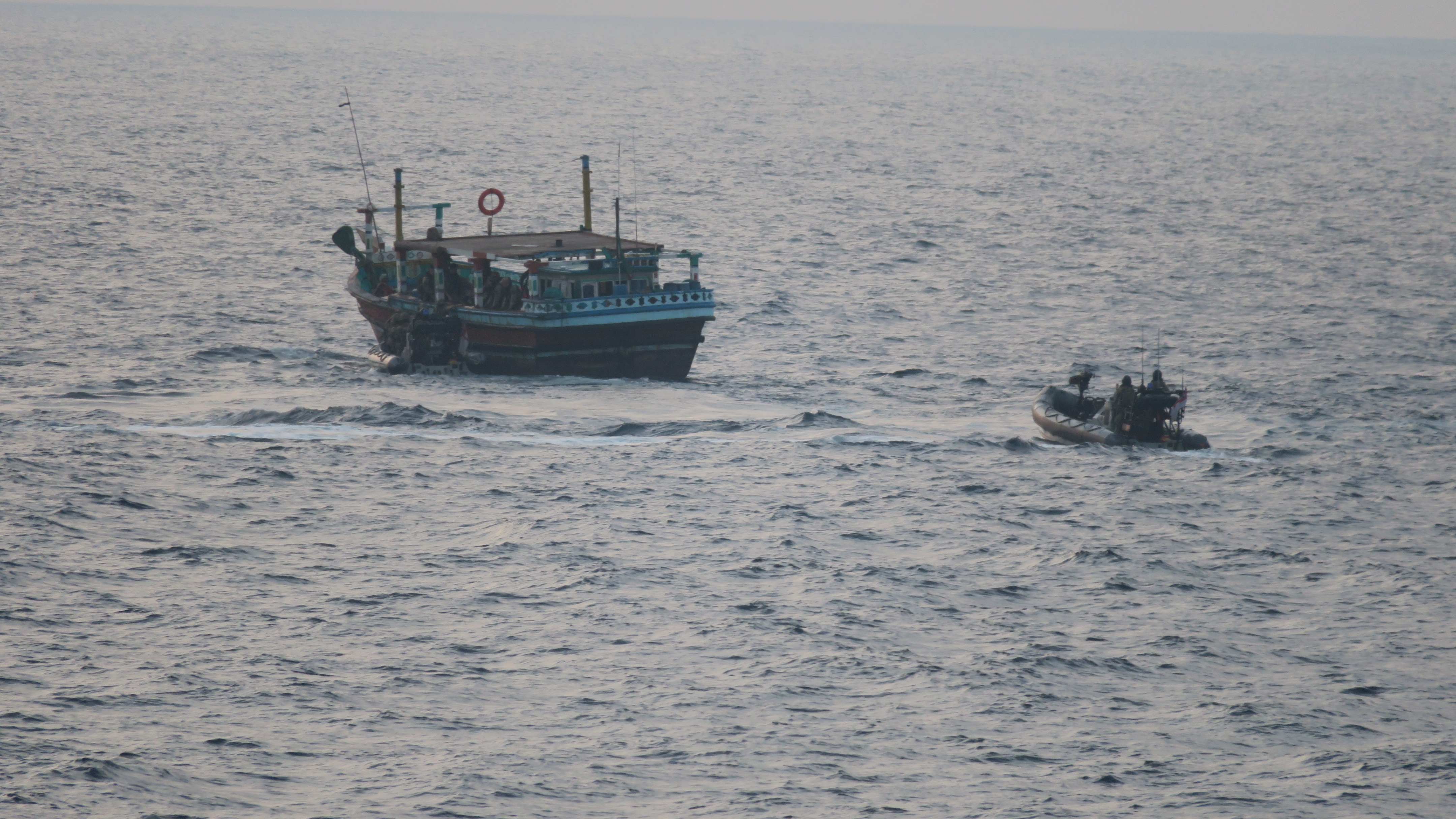 HMS Montrose's Rigid Hull Inflatable Boat prepares to board the dhow (Picture: Royal Navy).