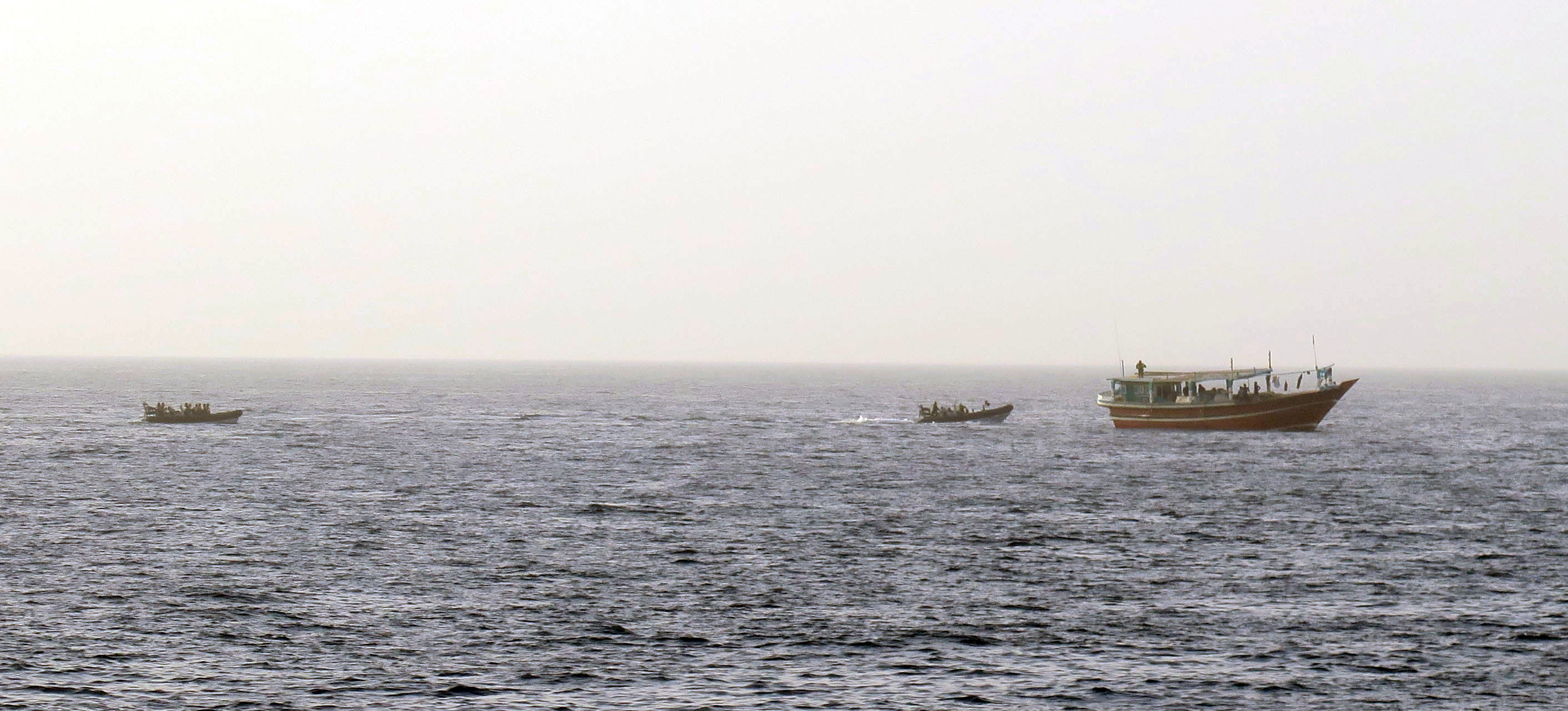 HMS Montrose's boarding teams approach the suspect dhow ready to begin their search for drugs 13052022 credit RN