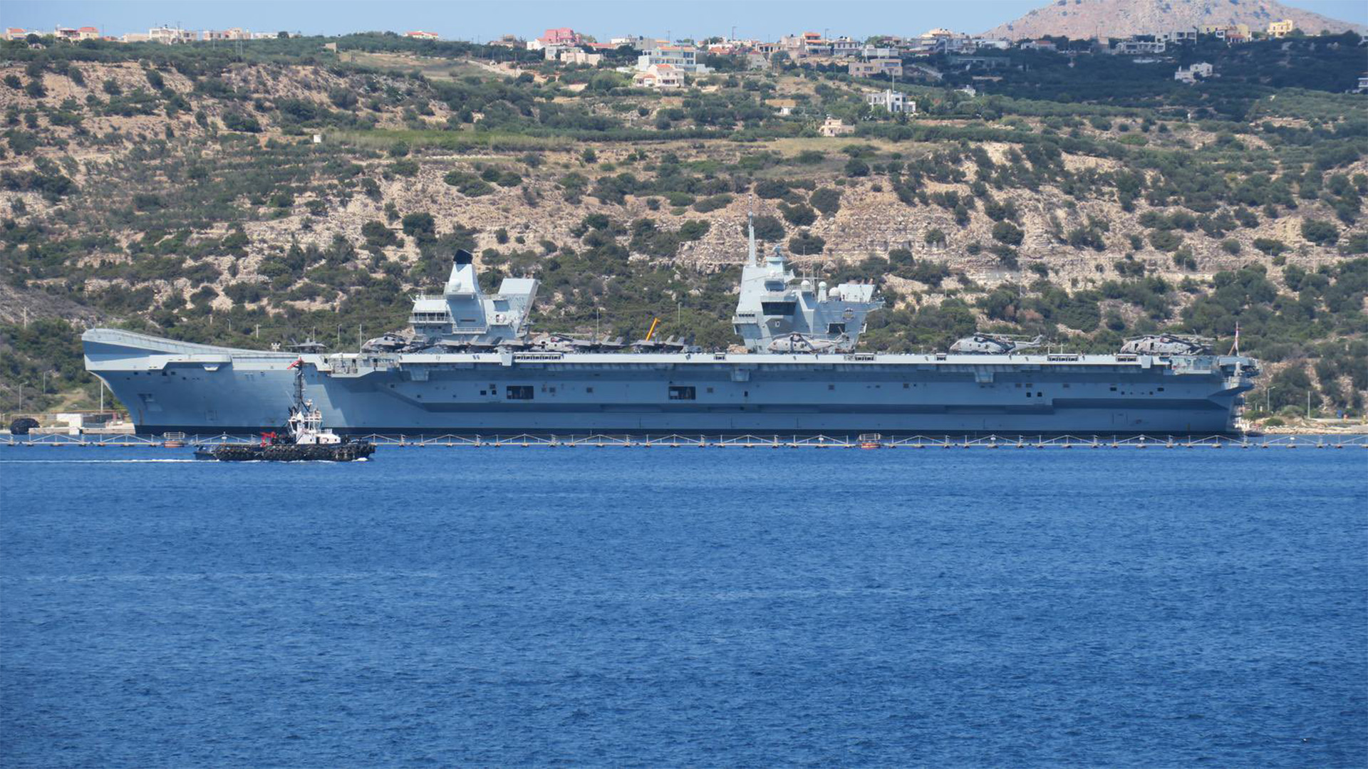 HMS Prince of Wales and the rest of CSG25 are temporarily docked in Souda Bay in Crete