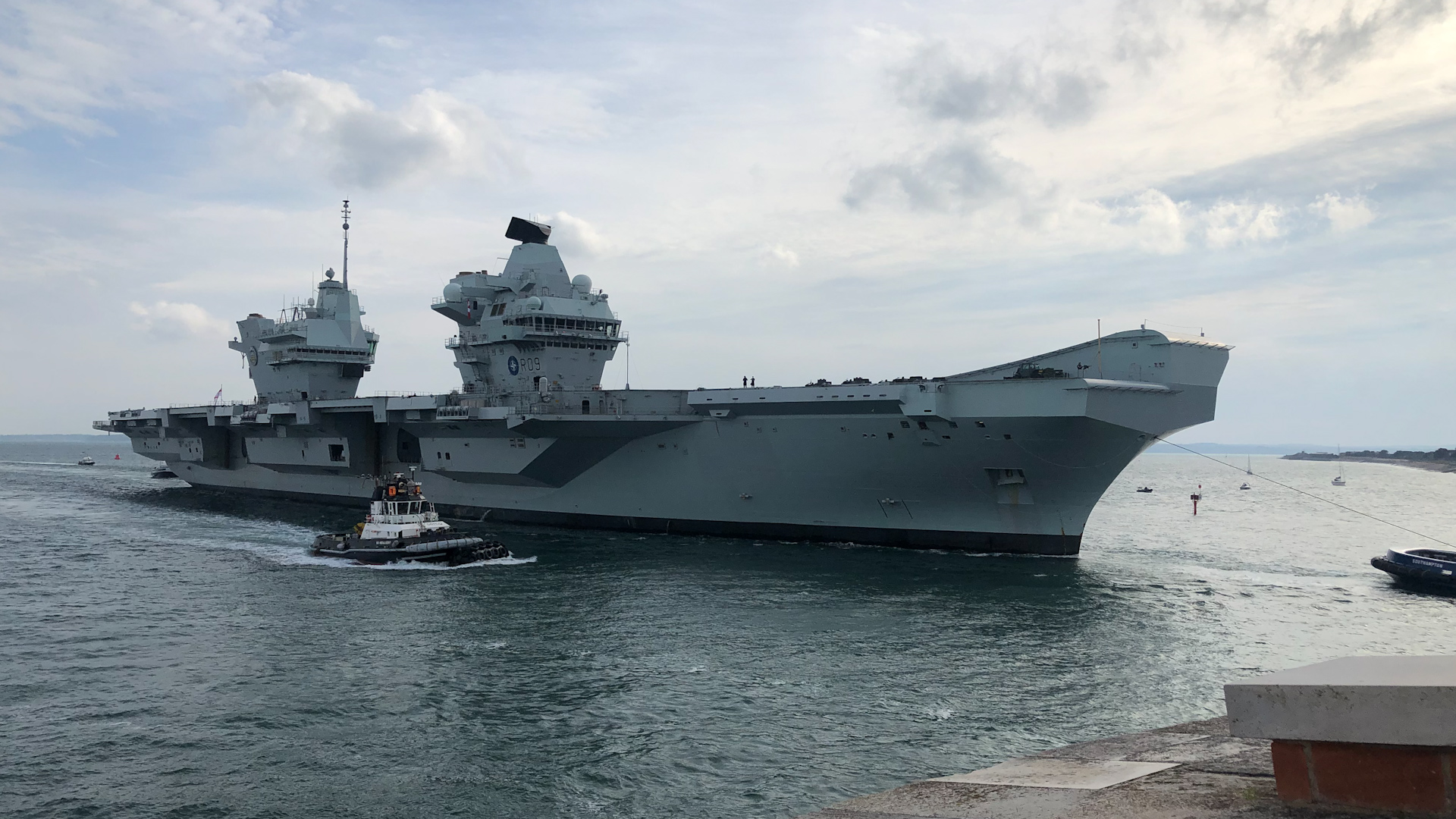 HMS Prince of Wales returning to Portsmouth after breaking down off the coast of the Isle of Wight.