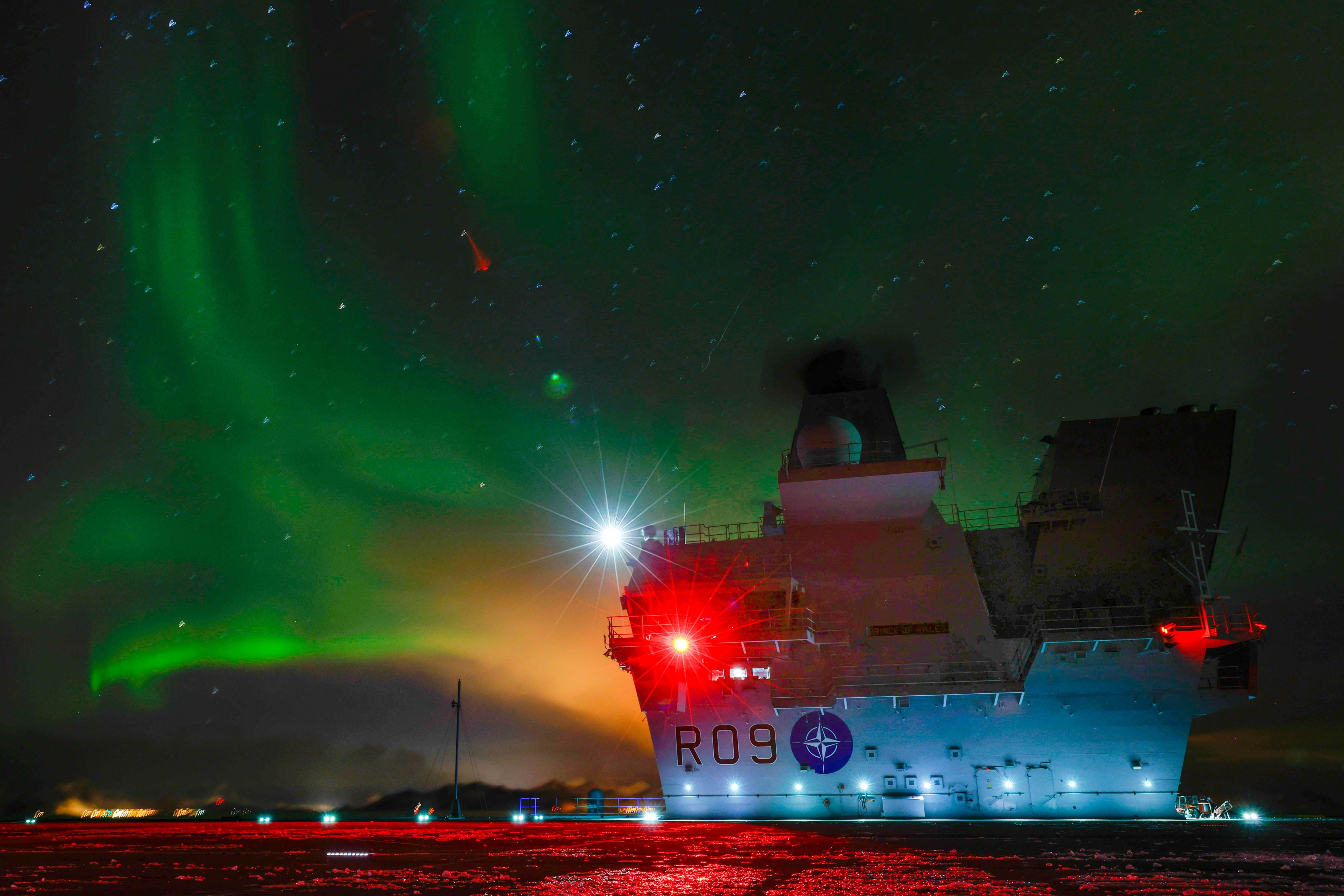HMS Prince of Wales surrounded by Northern Lights on Exercise Cold Response 2022 280322 CREDIT HMS PRINCE OF WALES, TWITTER