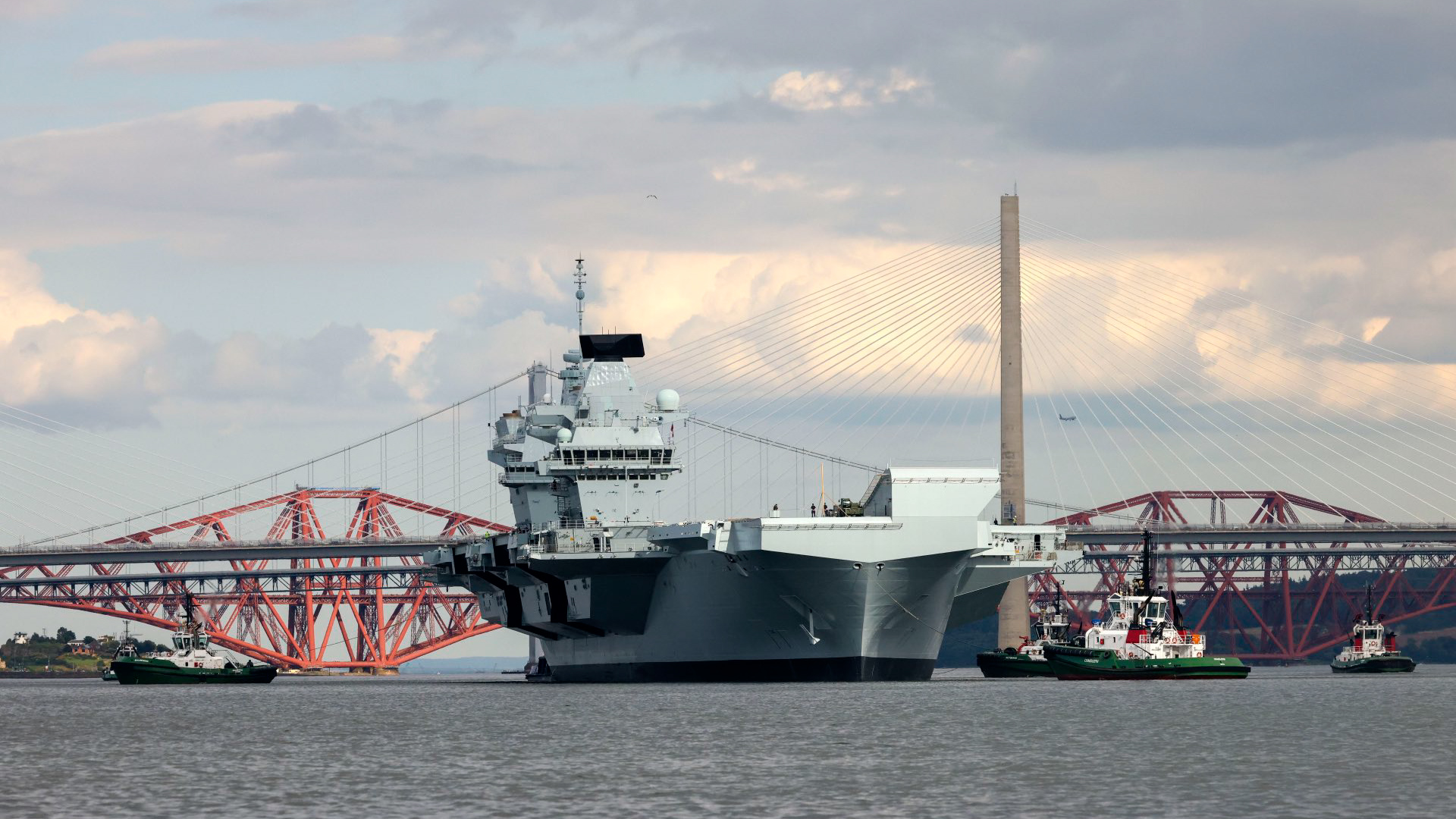 HMS Prince of Wales travelling under the Forth Bridges after nine months of repairs in Rosyth, Scotland 250723 CREDIT HMS Prince of Wales Twitter.jpg