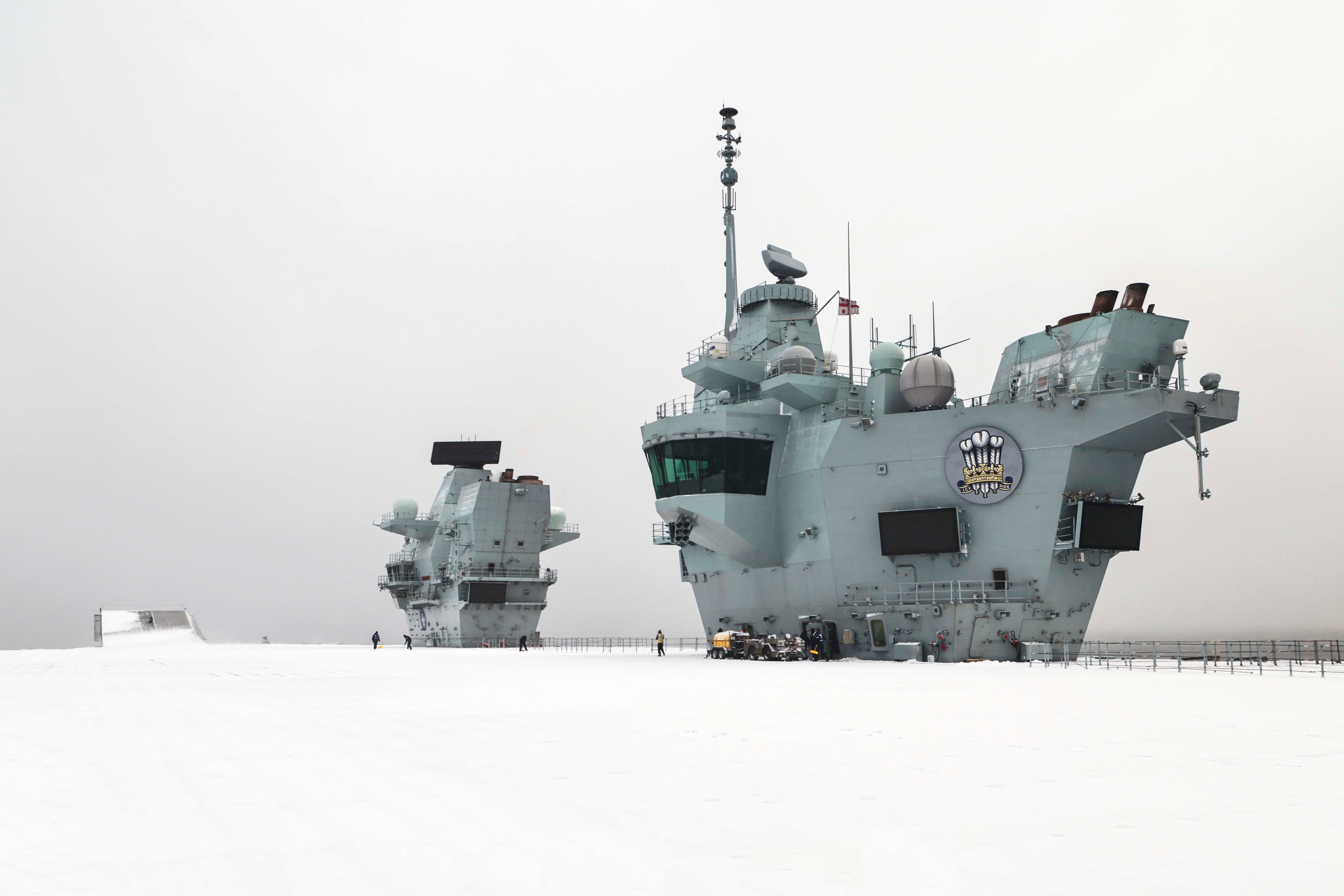 HMS Prince of Wales' flight deck covered in snow whilst deployed in the Arctic on NATO's Exercise Cold Response