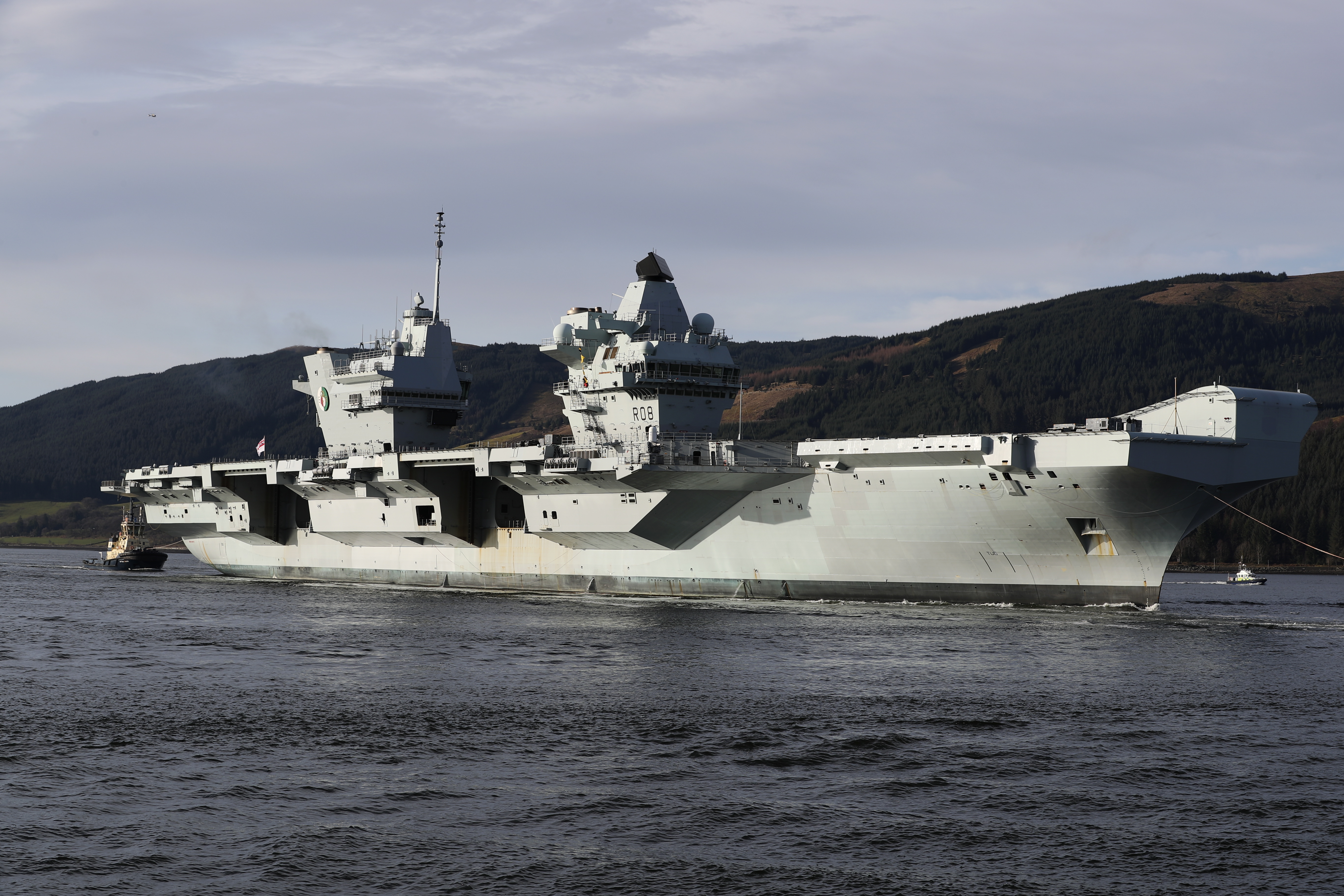 HMS Queen Elizabeth arriving at the new Northern Ammunition Jetty in Western Scotland for final preparations before her maiden operational deployment later this year 150321 CREDIT Royal Navy.
