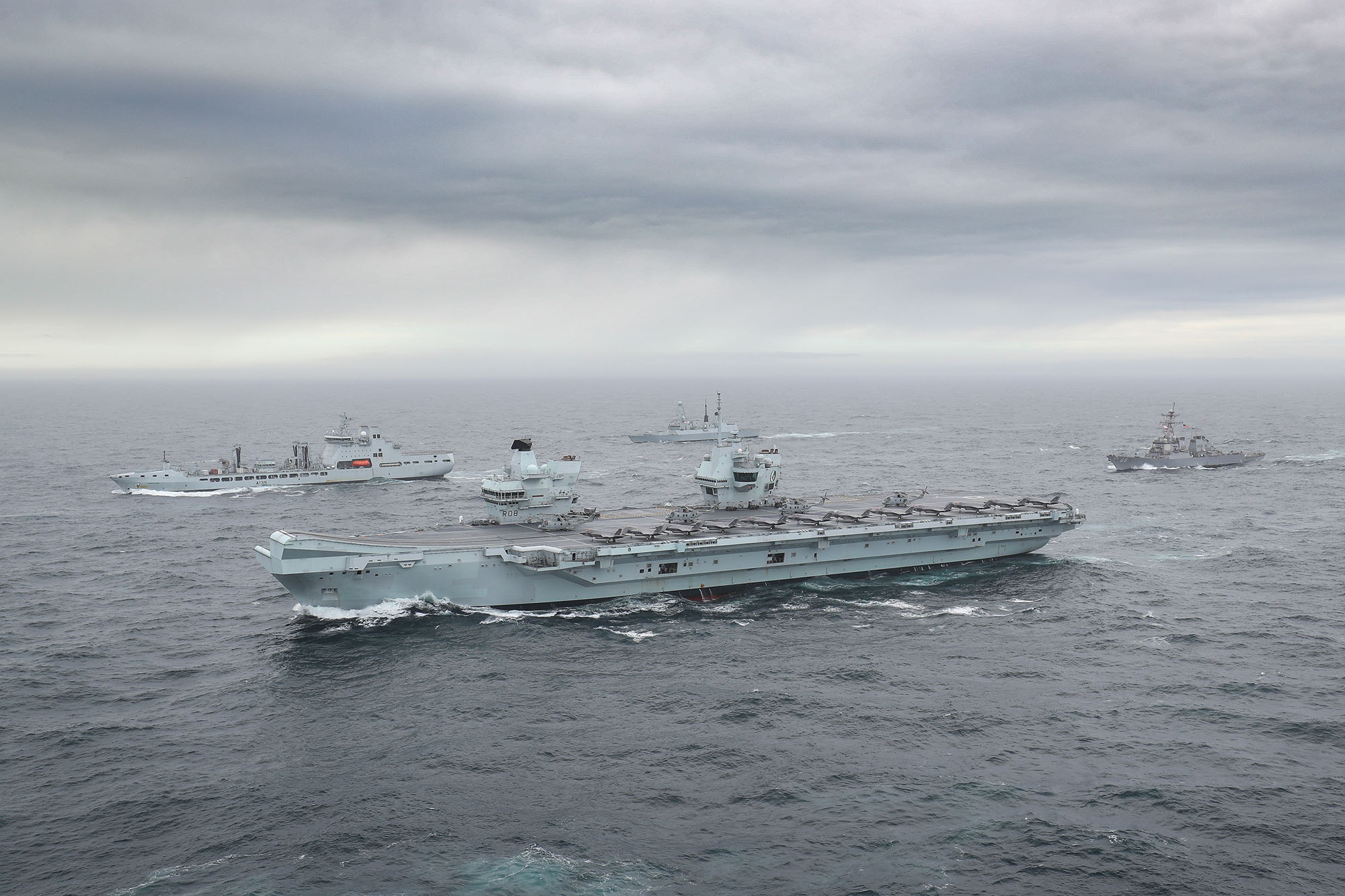 HMS Queen Elizabeth with other vessels as part of the Carrier Strike Group (Picture: Royal Navy).