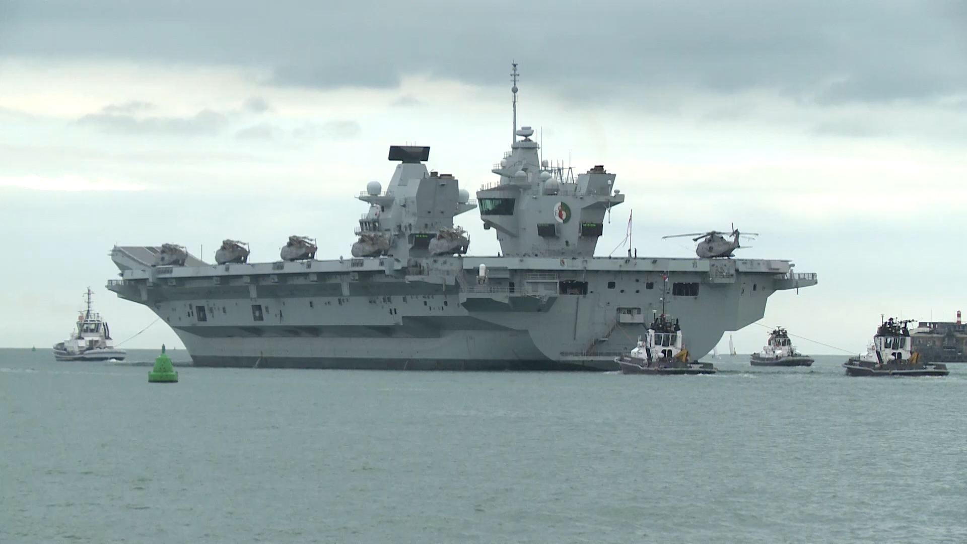 HMS Queen Elizabeth leaving Portsmouth, for training exercise, after her departure date was postponed due to COVID-19