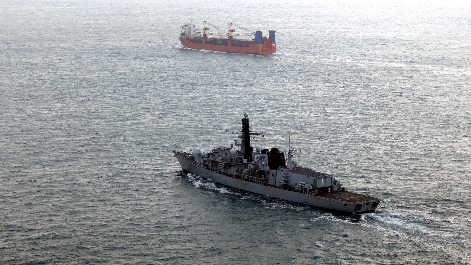 HMS Somerset kept a watchful eye on the Russian cargo ship the Baltic Leader while she was in UK waters