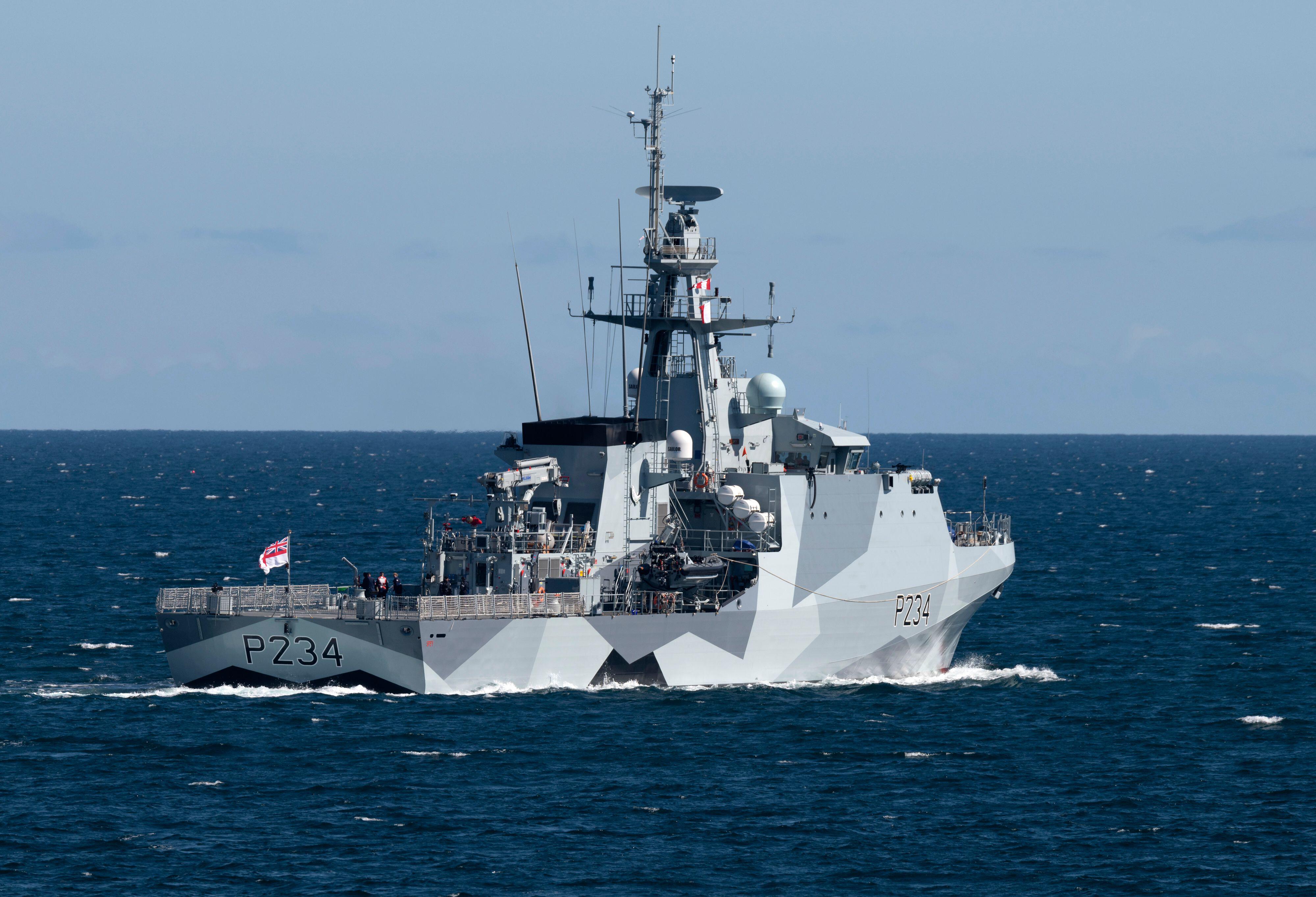 HMS Spey leaving Falmouth Harbour with dazzle paintwork 040621 CREDIT BOB SHARPLES ALAMY 2.jpg