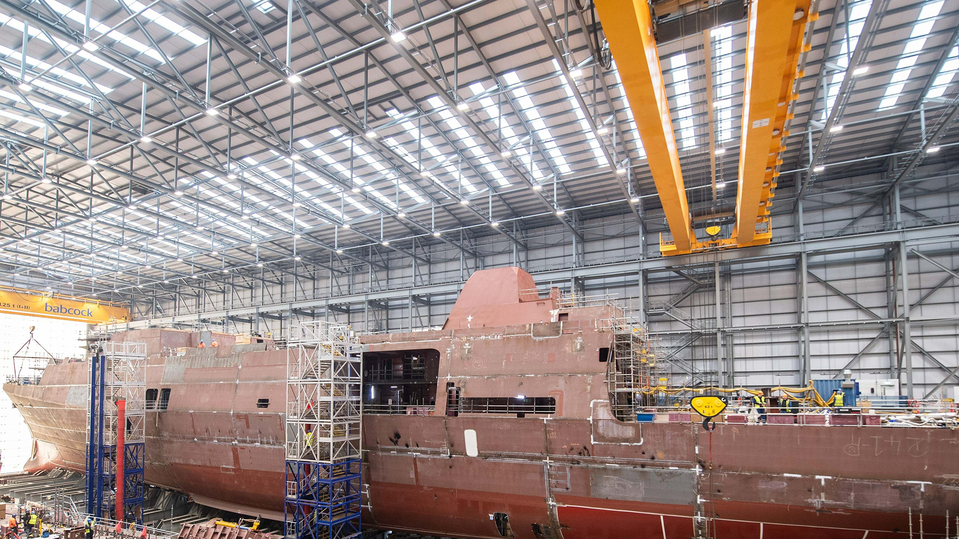 HMS Venturer raised on jacks to assess her weight
