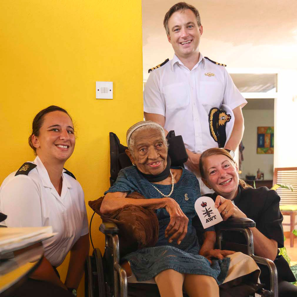 HMS Dauntless' ship's company meets Second World War veteran Ena Collymore-Woodstock in Barbados CREDIT Royal Navy