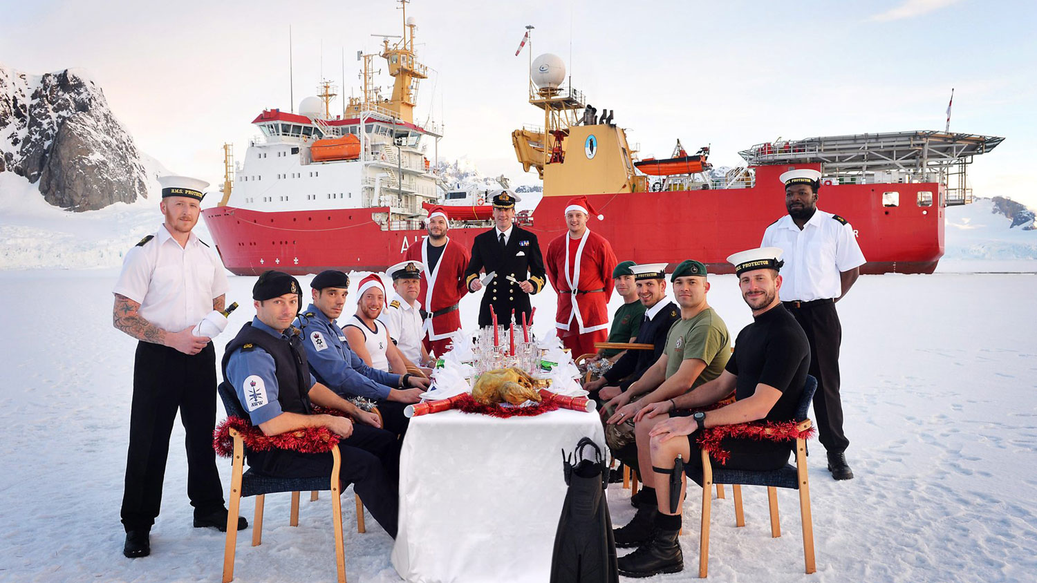 HMS Protector Official Christmas Photo 02.12.13 Christmas Dinner Icebergs Credit MOD & LA(Phot) Vicki Benwell