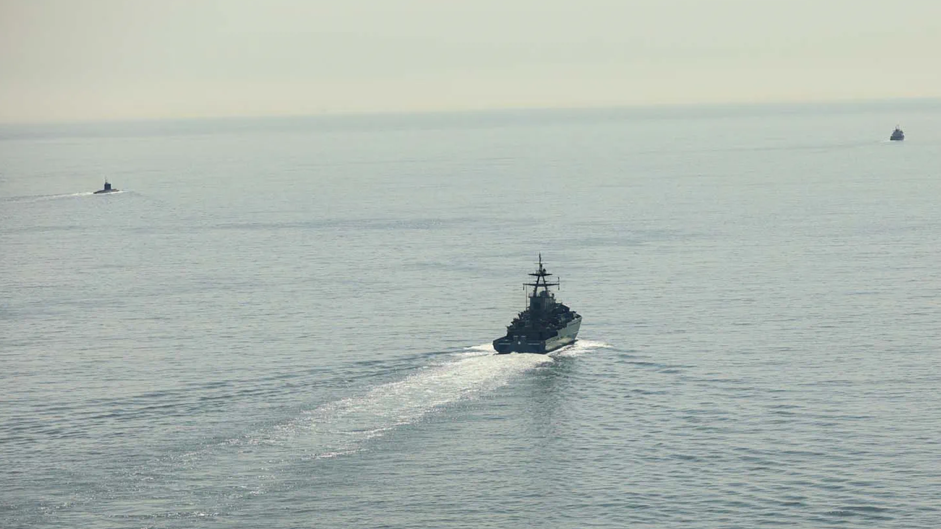 HMSMersey in the foreground tracks Novorossiysk and Yakov Grebelski CREDIT ROYAL NAVY