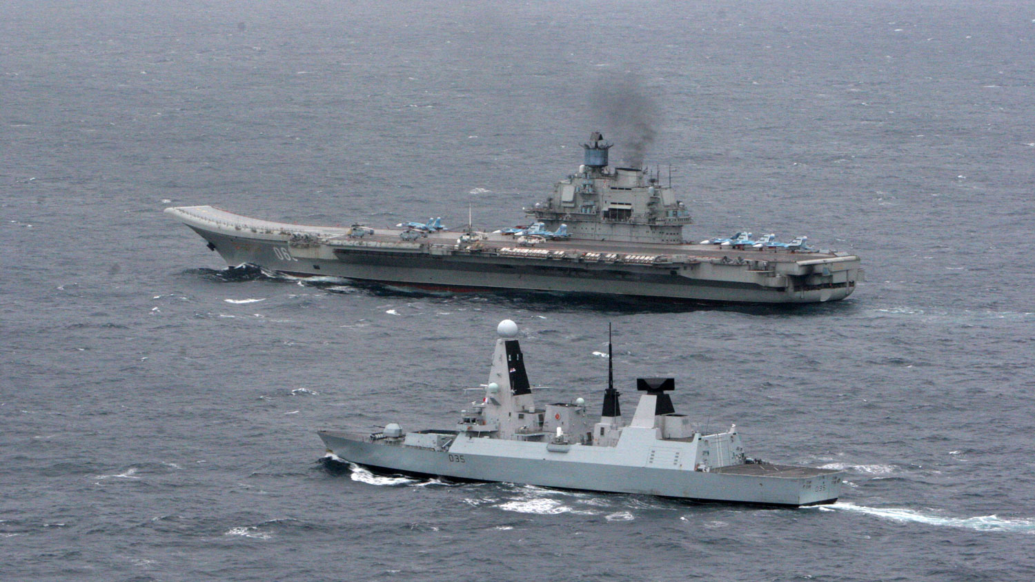 HMS Dragon (foreground) with Russian aircraft Carrier 'Admiral Kuznetsov' Credit Royal Navy