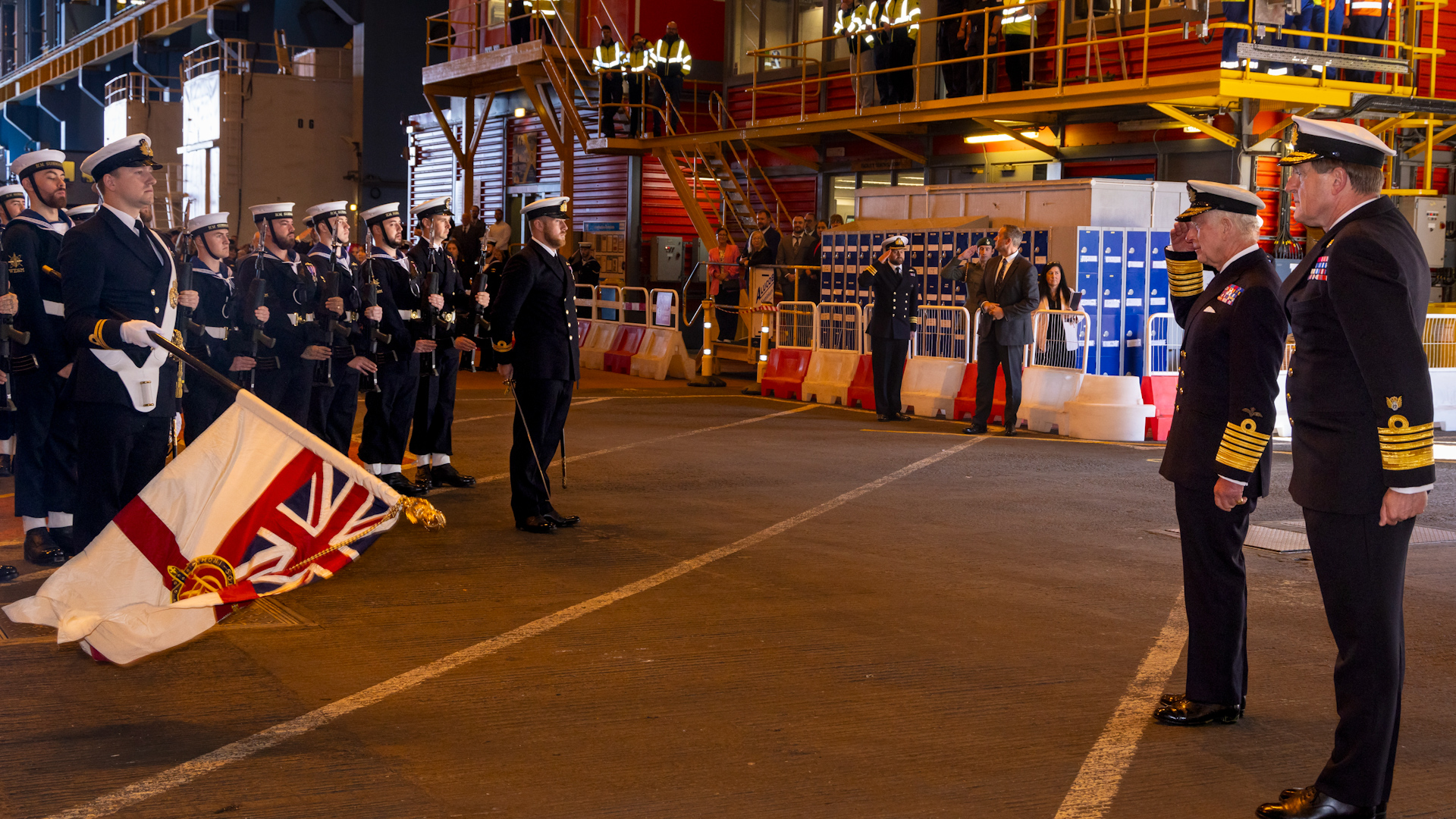 King Charles III saluting the Guard Of Honour with Sir Ben Key as he visited HM Naval Base Clyde (Picture: Royal Navy)