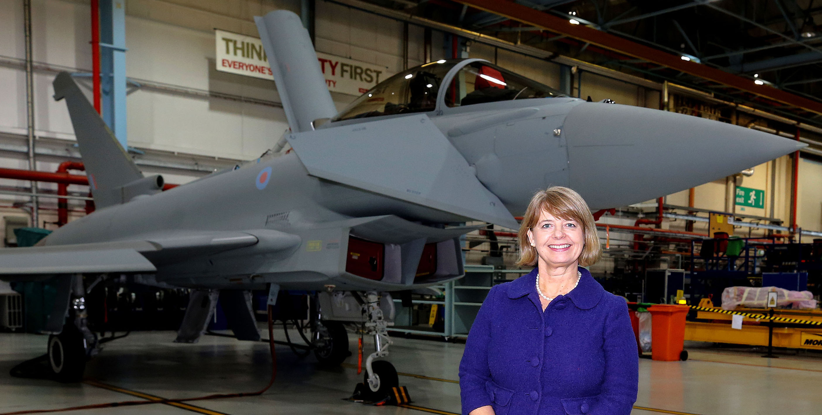 Harriett Baldwin next to a Typhoon jet