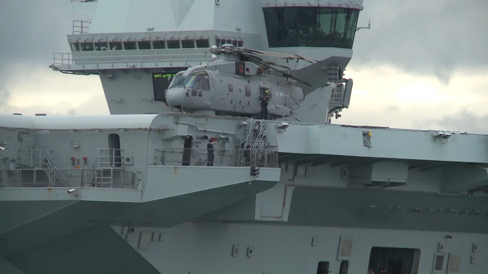 Helicopter onboard HMS Queen Elizabeth as she departs Portsmouth for training after her departure date was postponed due to COVID-19 