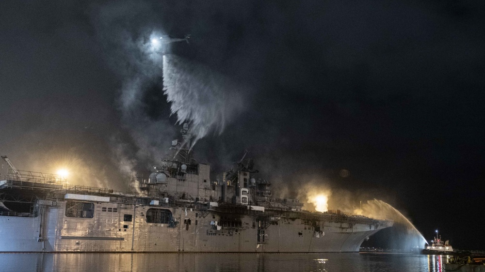 Helicopters fight fire on USS Bonhomme Richard