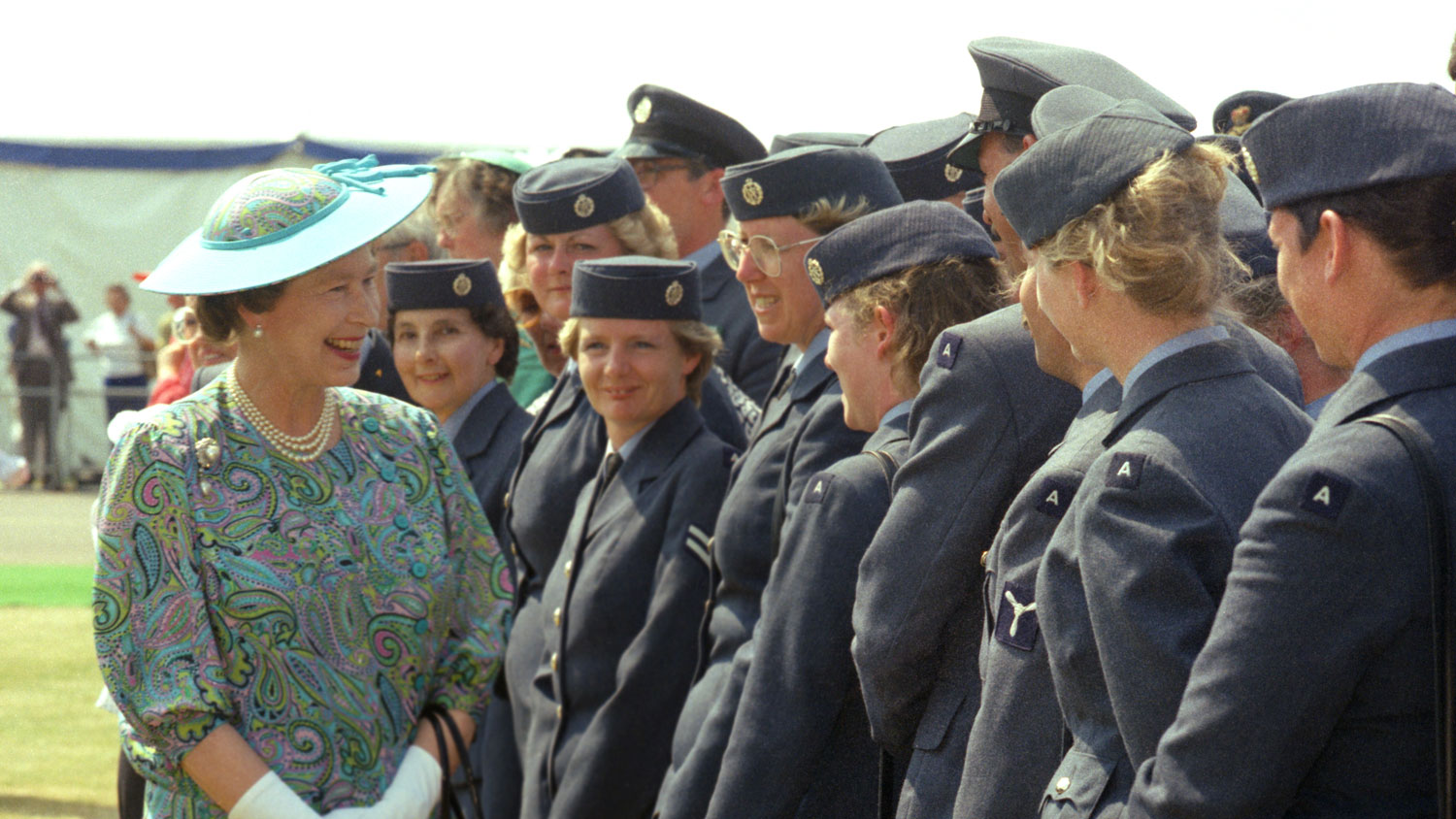Her Majesty Queen Elizabeth II pictured with members of the Royal Auxiliary Air Force at RAF Benson in South Oxfordshire June 1989 CREDIT Crown Copyright