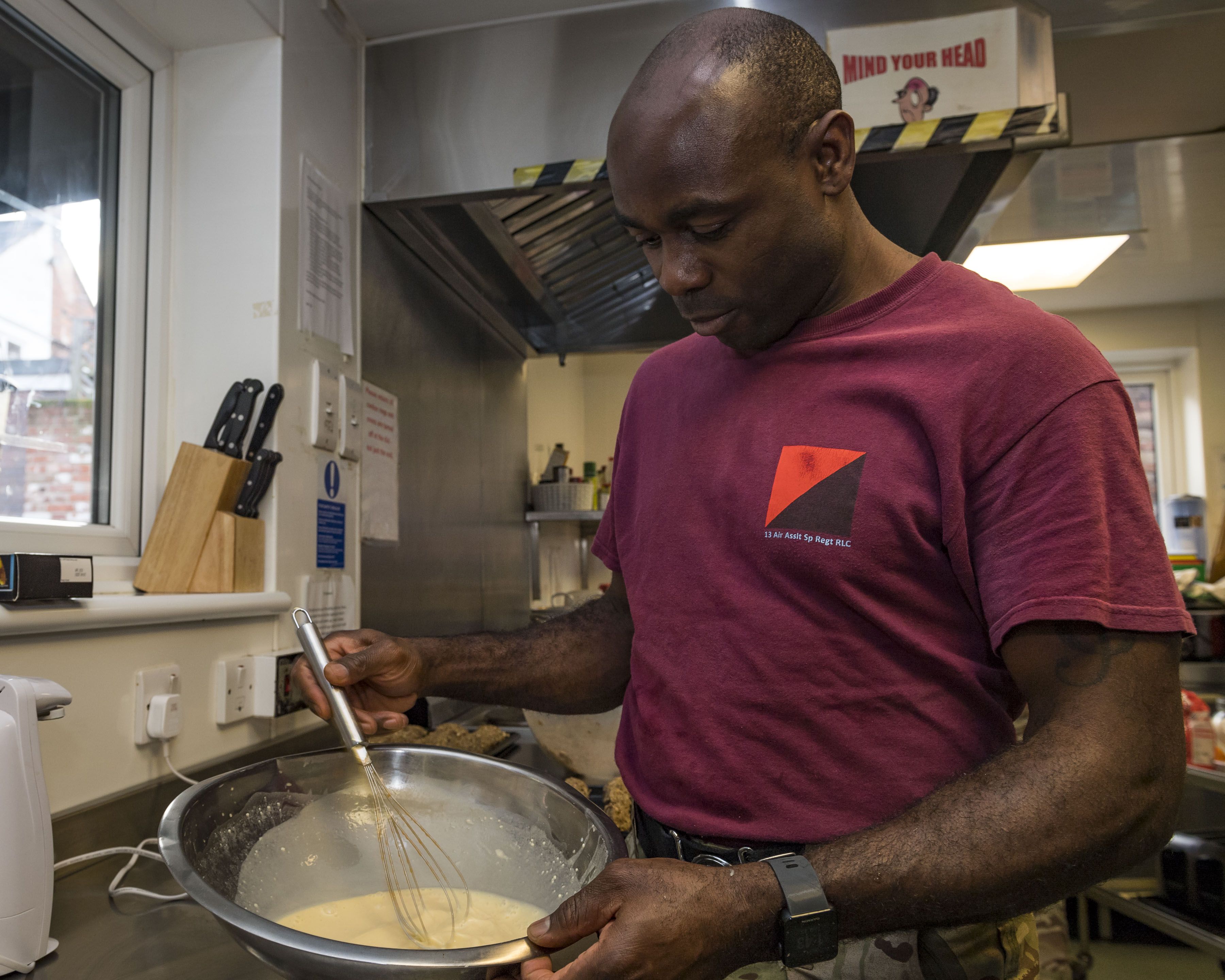 Sgt Herbert Goredema gets to grips with the sauce