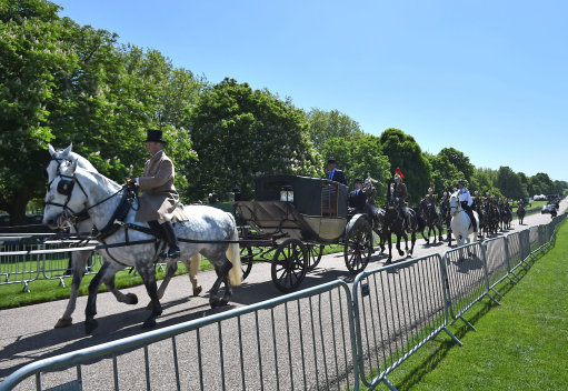 A horsedrawn carriage goes up The Long Walk during the dress rehearsal (Picture: PA).