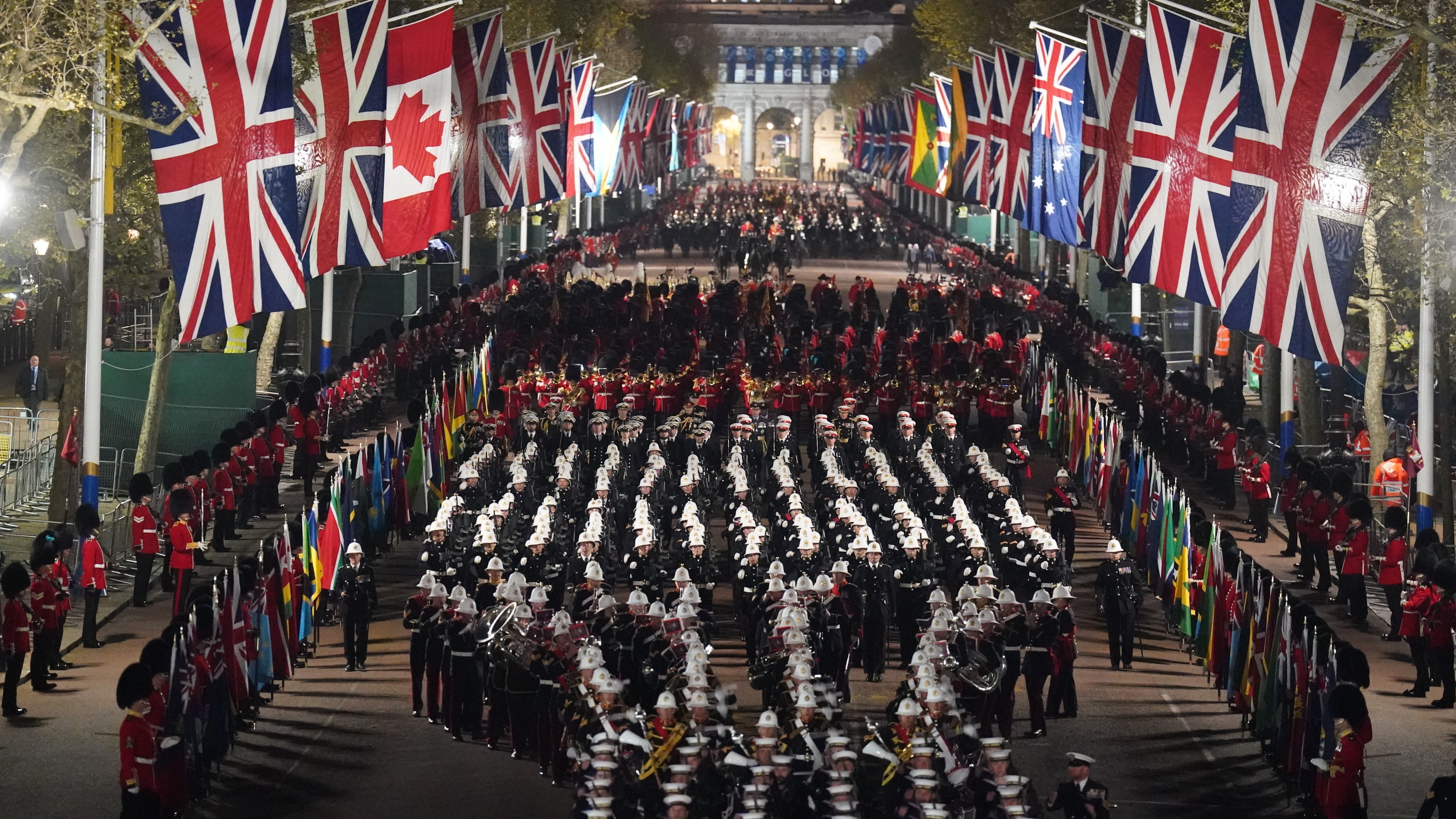 Hundreds of military personnel took part in a night time rehearsal in central London for the coronation