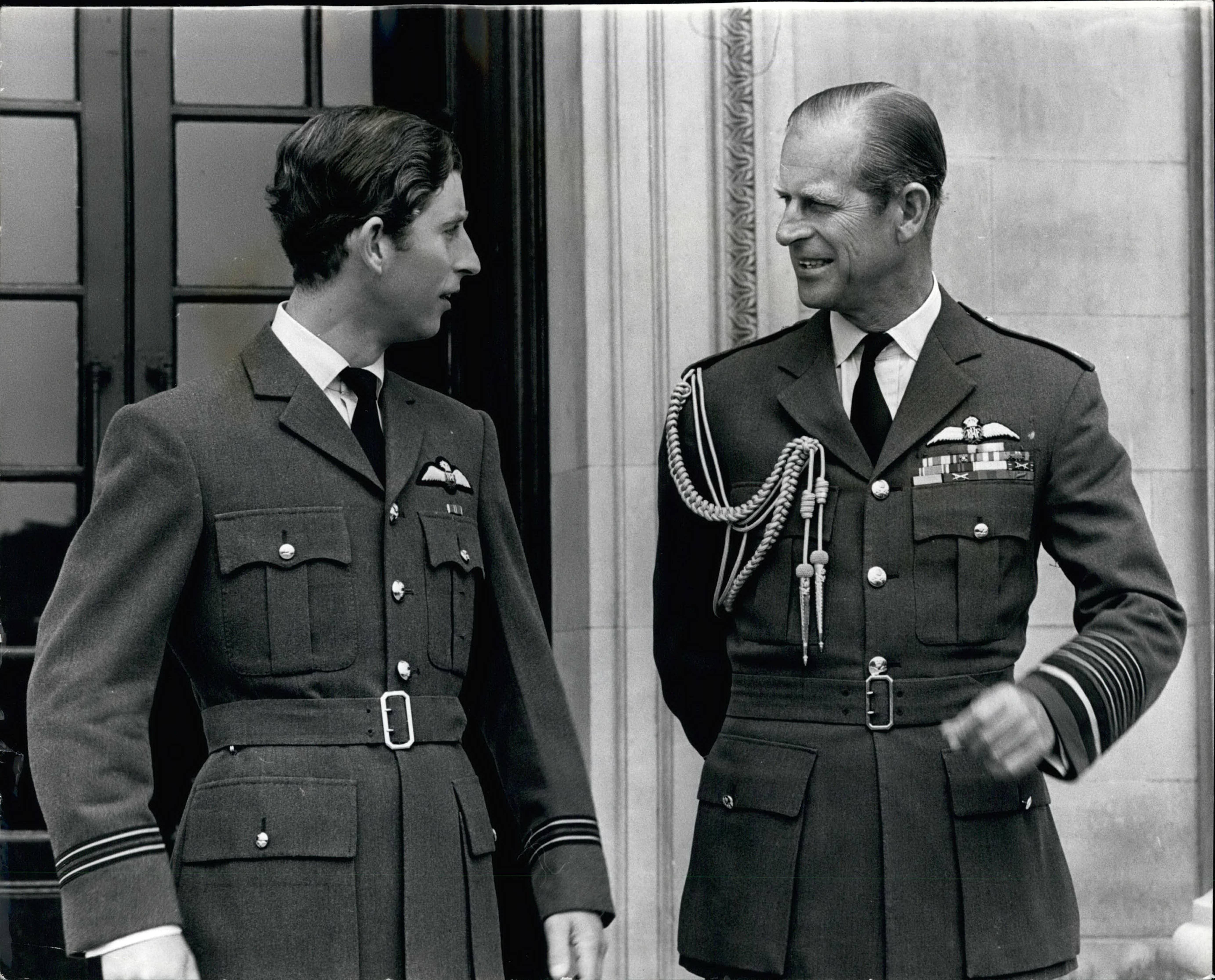 Prince Charles, on the day he received his wings at RAF College Cranwell, stood with Prince Philip who is also in uniform (Picture: Keystone Pictures , Zumapress, Keystone Press, Alamy).