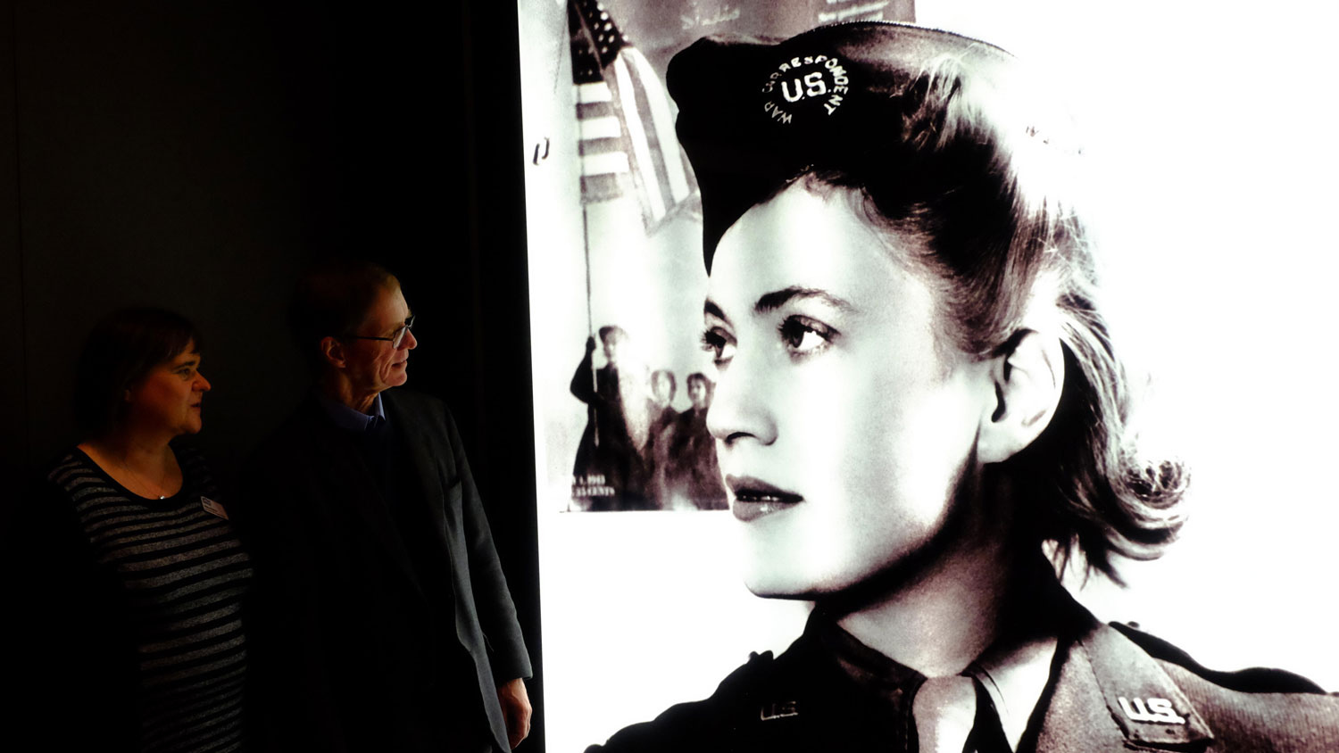 Image ID F423RH Anthony Penrose, son of photojournalist Lee Miller, and Curator Hilary Roberts looking at image of Lee Miller in uniform at an exhibition at Imperial War Museum CREDIT Rachel Megawhat Alamy Live News EXP 231124