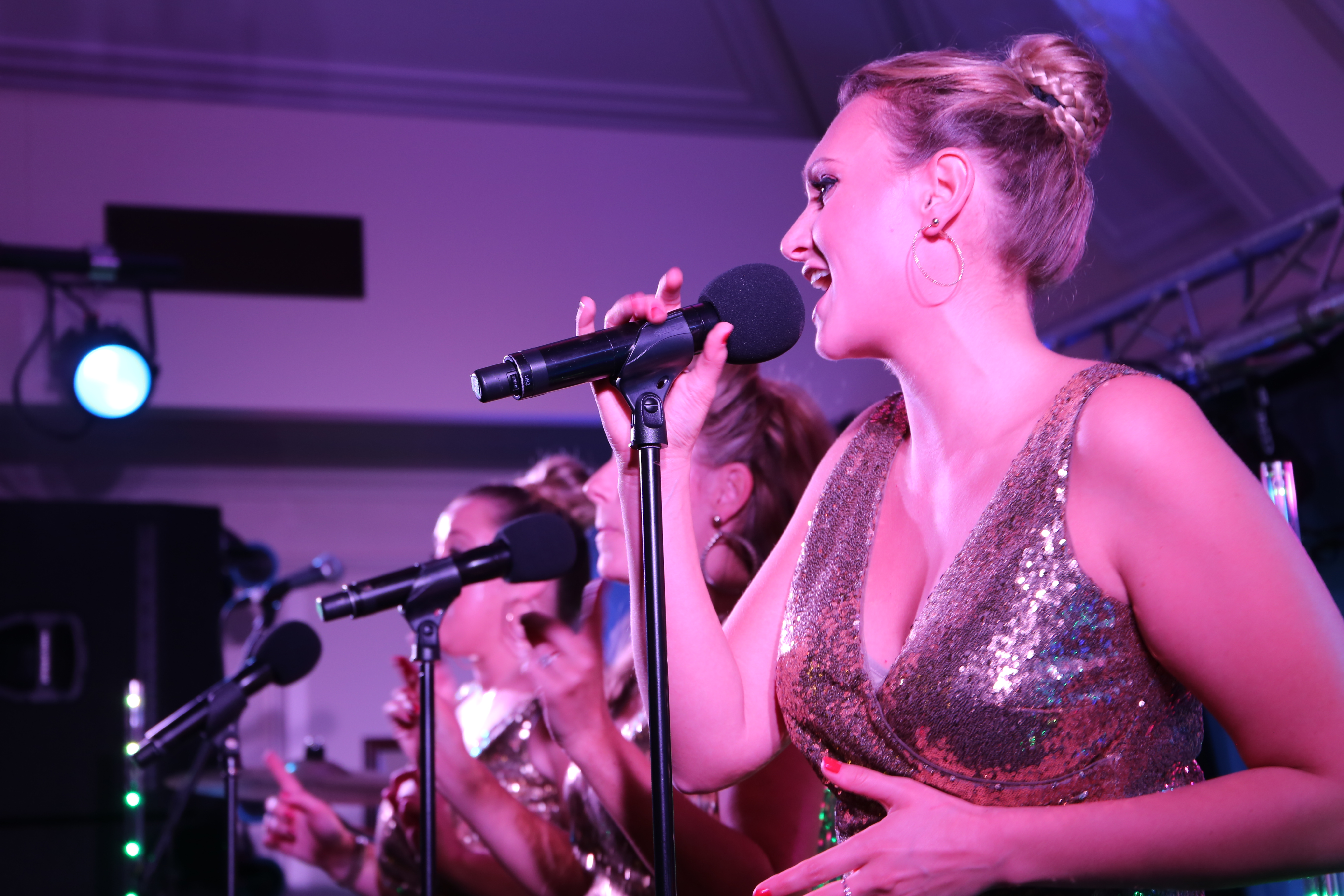 The Estrellas onstage at the Chelsea pensioners Club for CSE