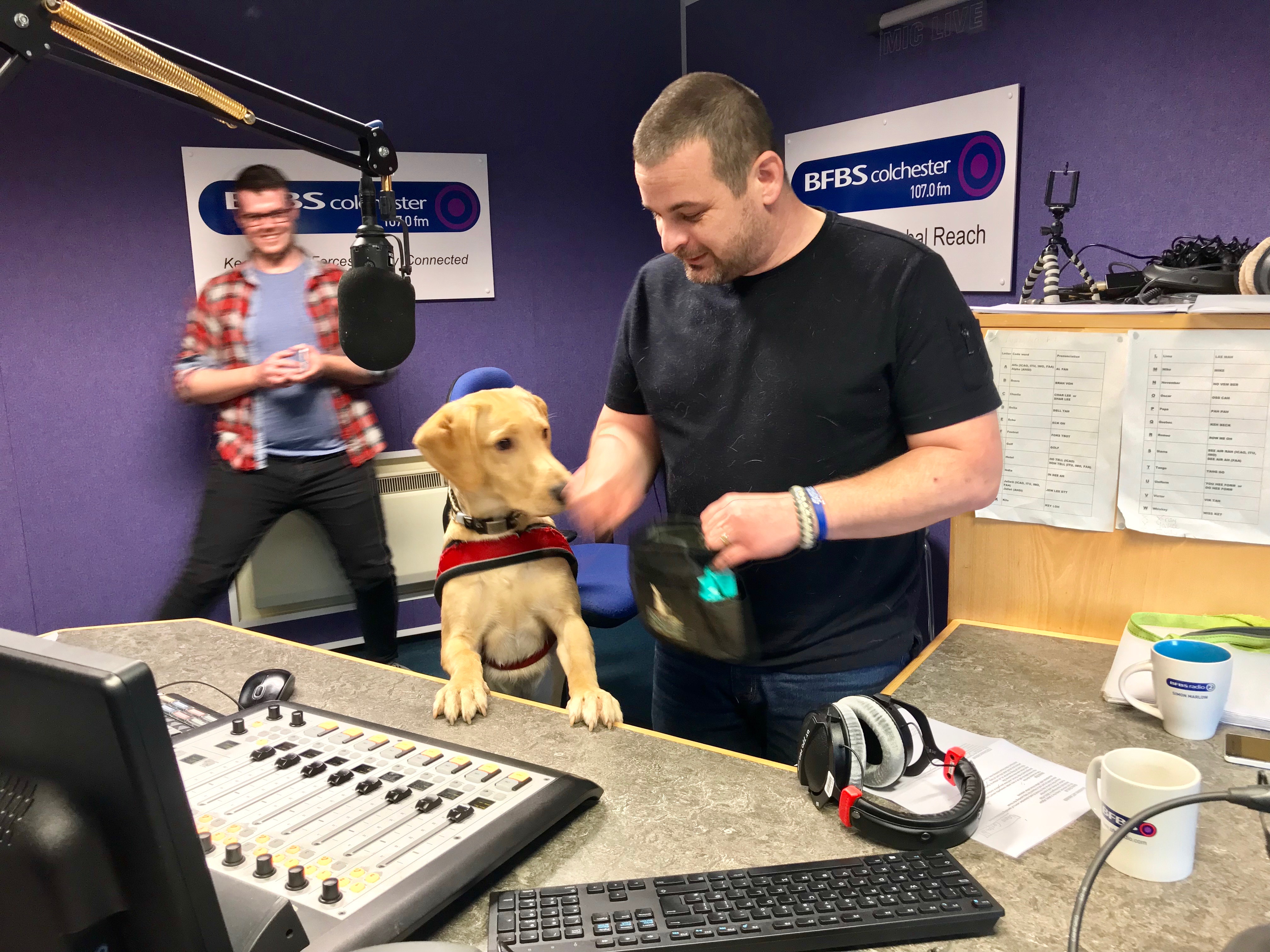 Blake Clark and his support dog Odin telling BFBS Colchester their story