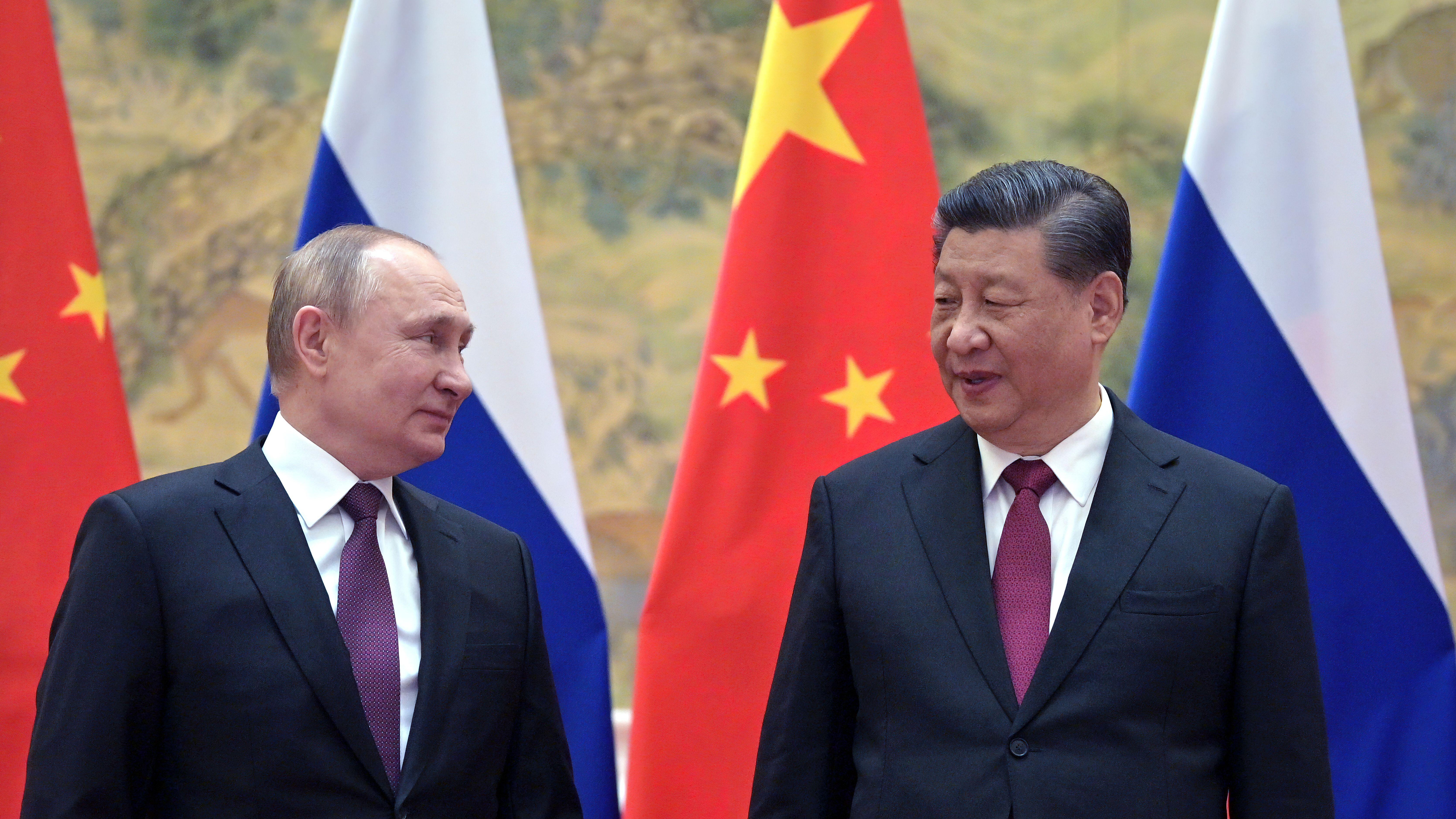 Russian President Vladimir Putin (left) with President of China Xi Jinping at the opening of the Beijing 2022 Winter Olympics