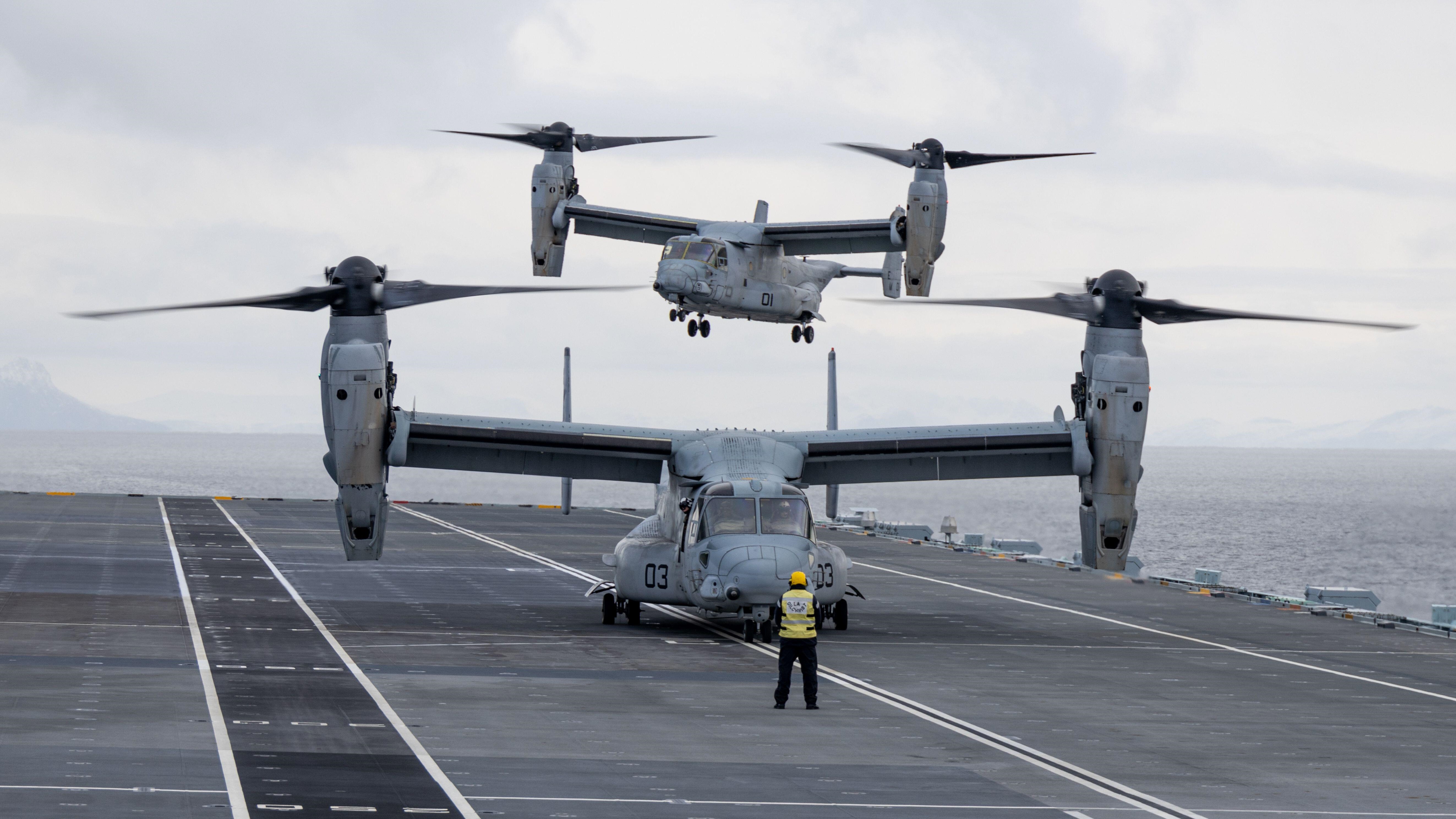 Image ID 2J245NK US Marines land two MV-22B Ospreys on HMS Prince of Wales during Ex Cold Response 2022, Norwegian Sea 26032022 CREDIT APFootage,Alamy Stock Photo