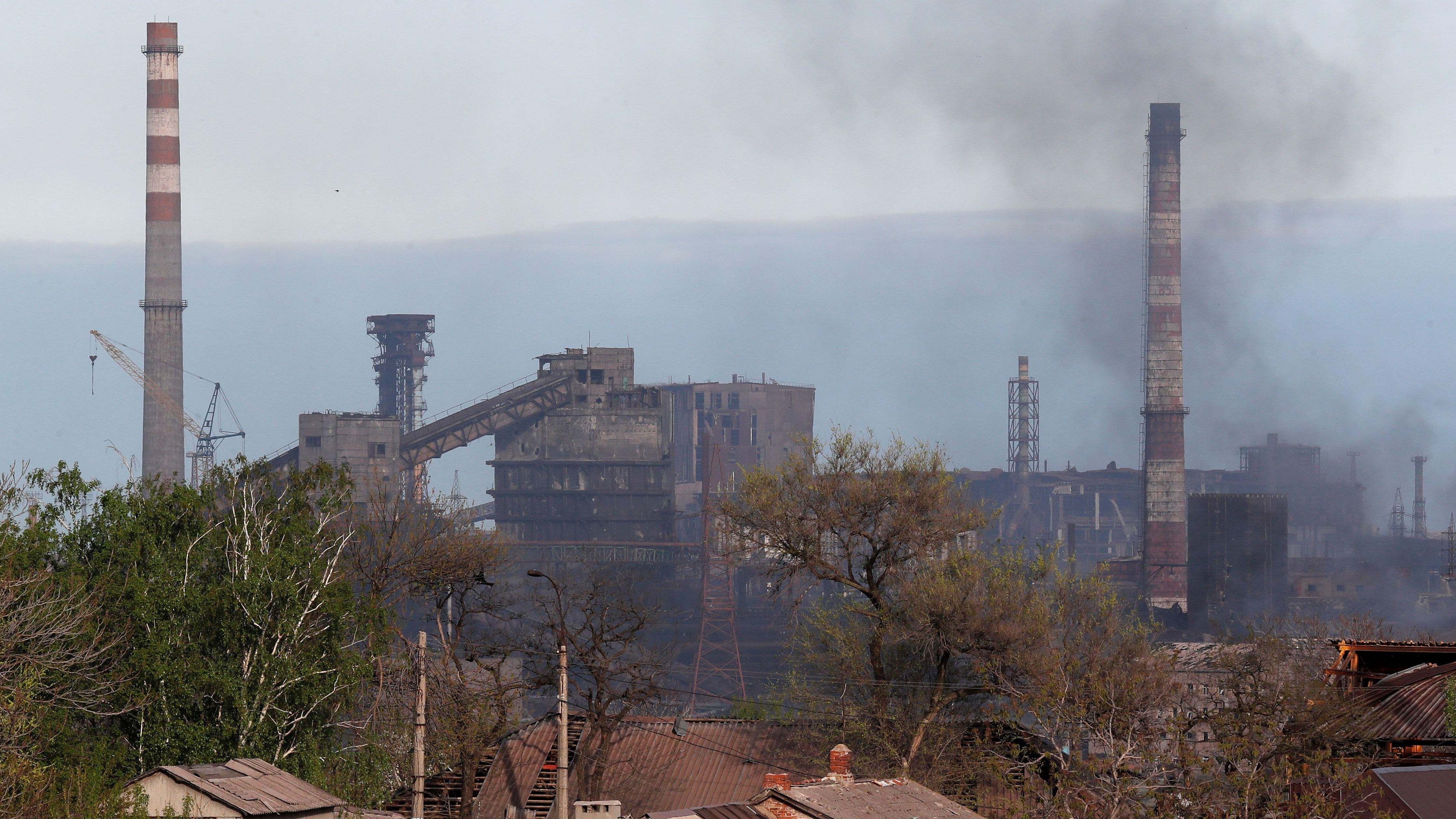 Image ID 2J6R5KK Smoke rises above a plant of Azovstal Iron and Steel Works in the southern port city of Mariupol 03052022 CREDIT REUTERS,Alamy Stock Photo.jpg