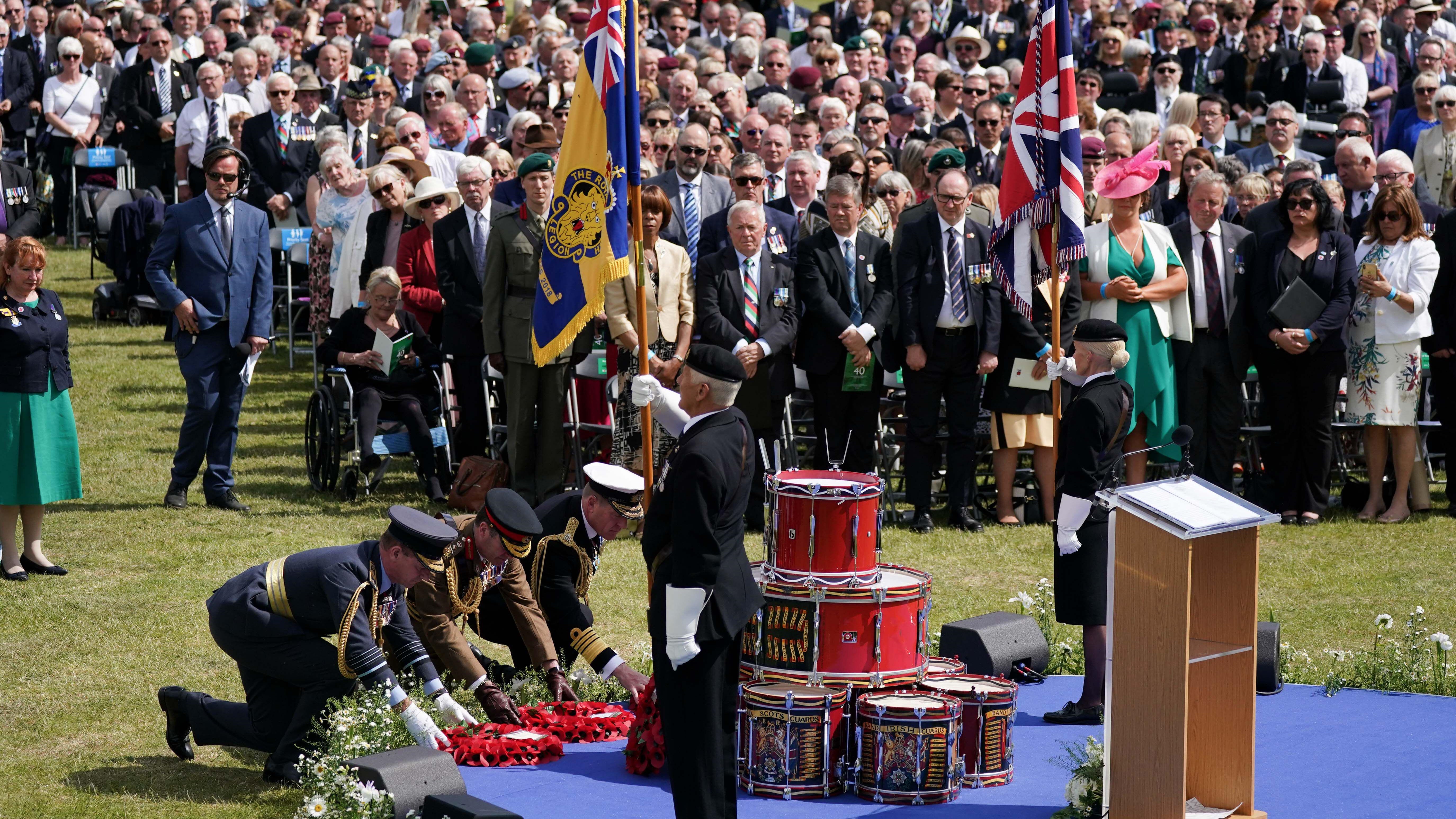 Image ID 2JCMAAC Military personnel lay wreaths during Falklands memorial service at the National Memorial Arboretum 14062022 CREDIT PA, Alamy Stock Photo.jpg