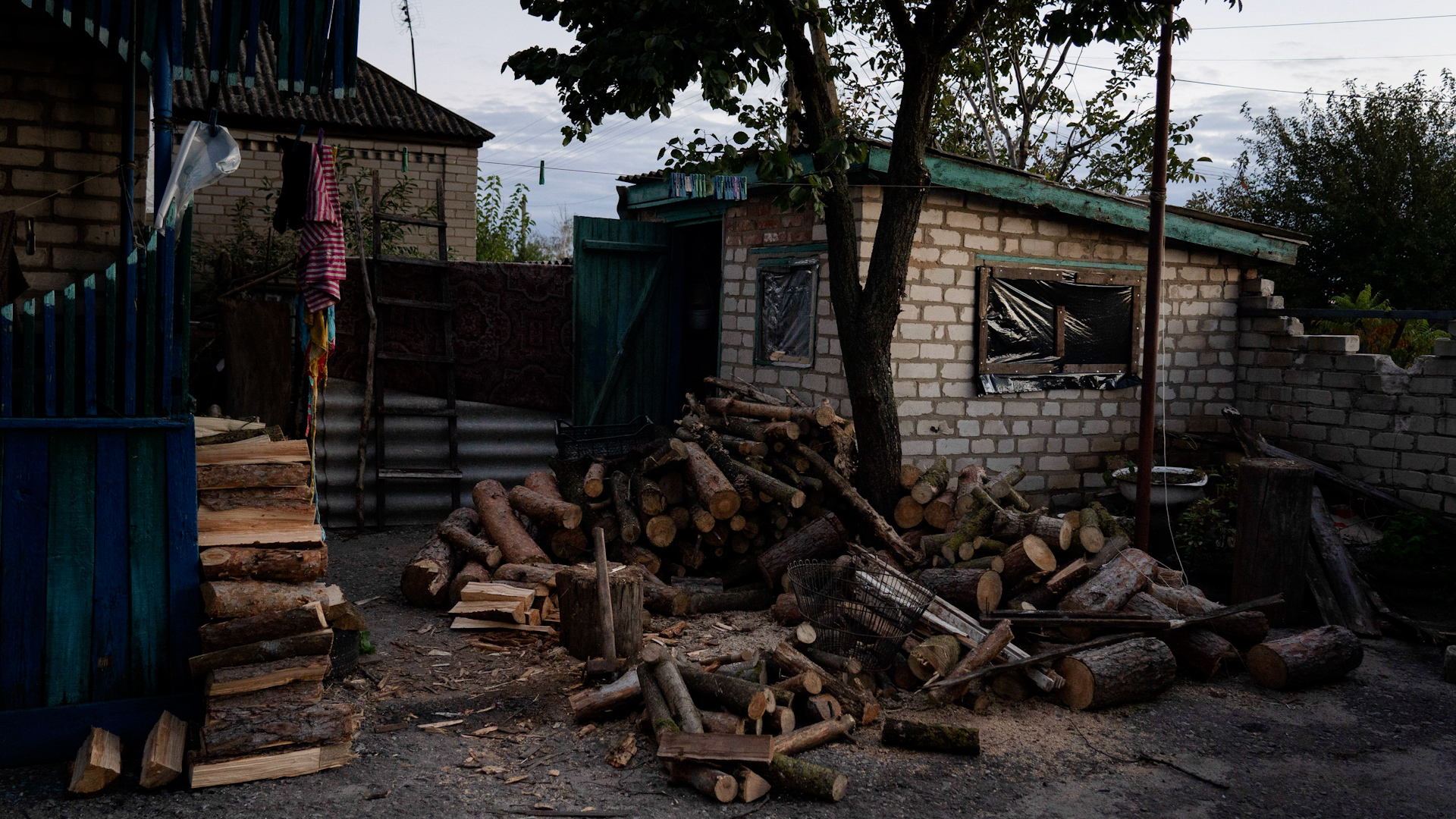 A pile of logs seen gathered outside a house in Lyman (Picture: Sipa US/Alamy Stock Photo).