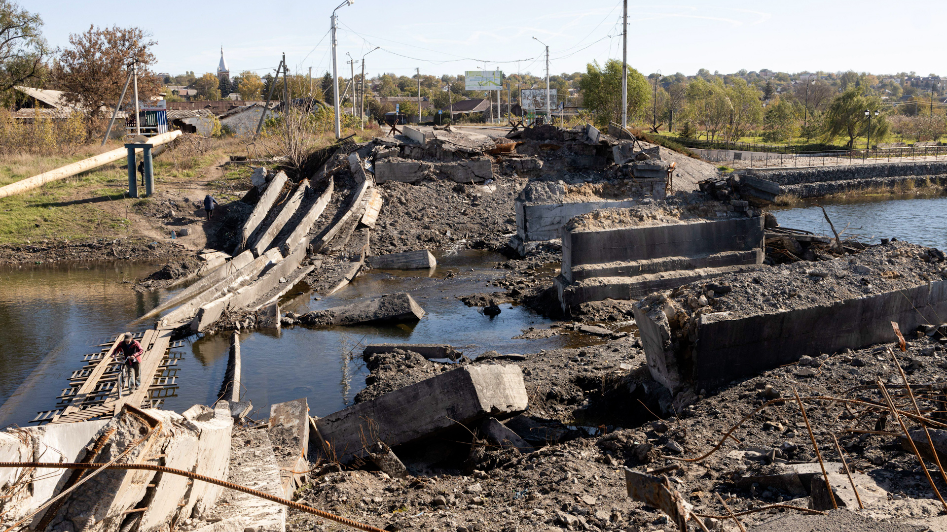 A collapsed bridge likely destroyed by Ukrainian forces to remove strategic advantage of Russian troops in Bakhmut (Picture: SOPA Images Limited/Alamy Stock Photo).