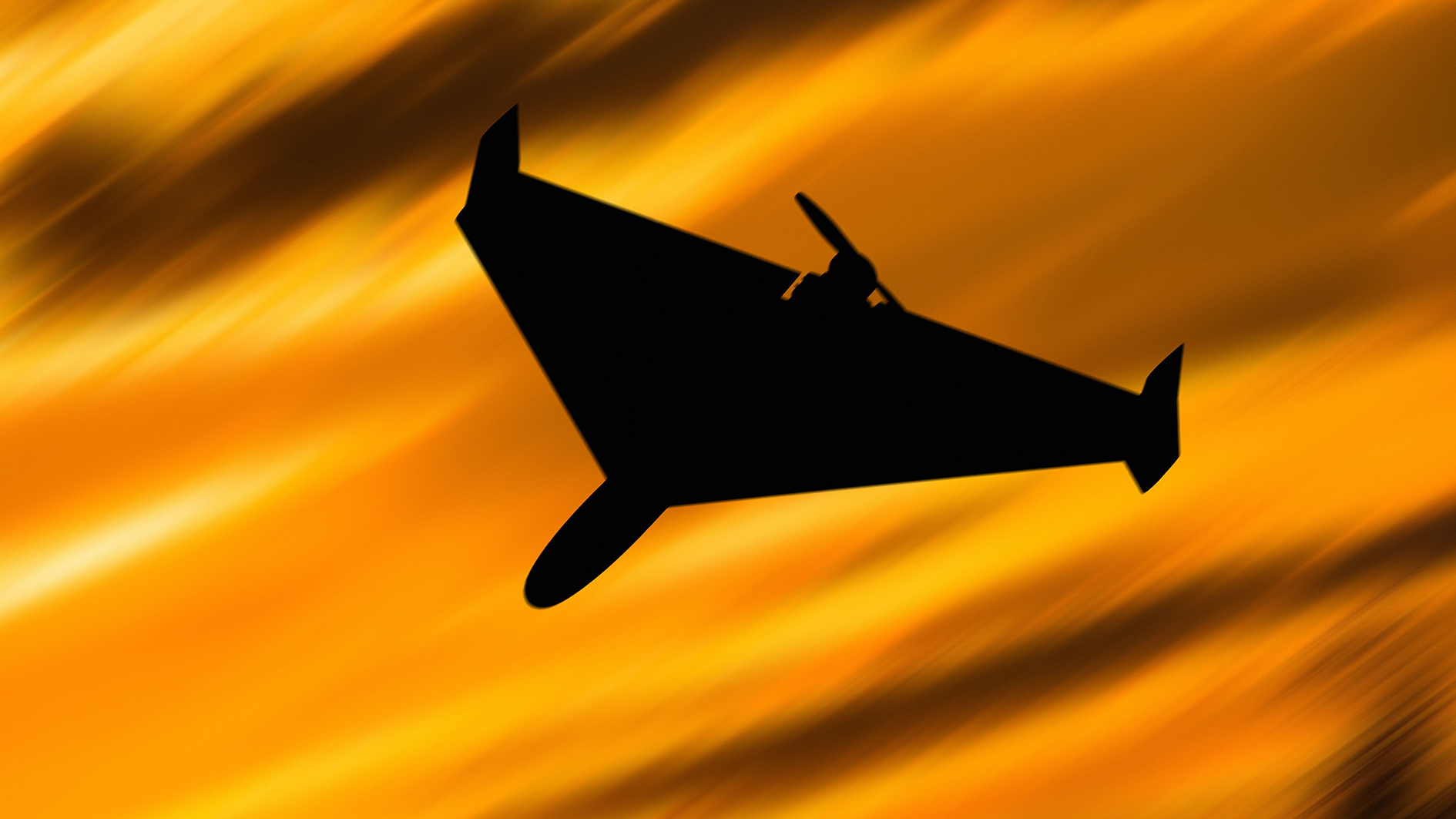 Image ID 2KANJKF Ukraine. 03rd Nov, 2022. Silhouette of an Iranian kamikaze drone Shahed136 at sunset. Combat drone used by Russia in the bombing of Ukraine in the war CREDIT Alamy Live News 010323.